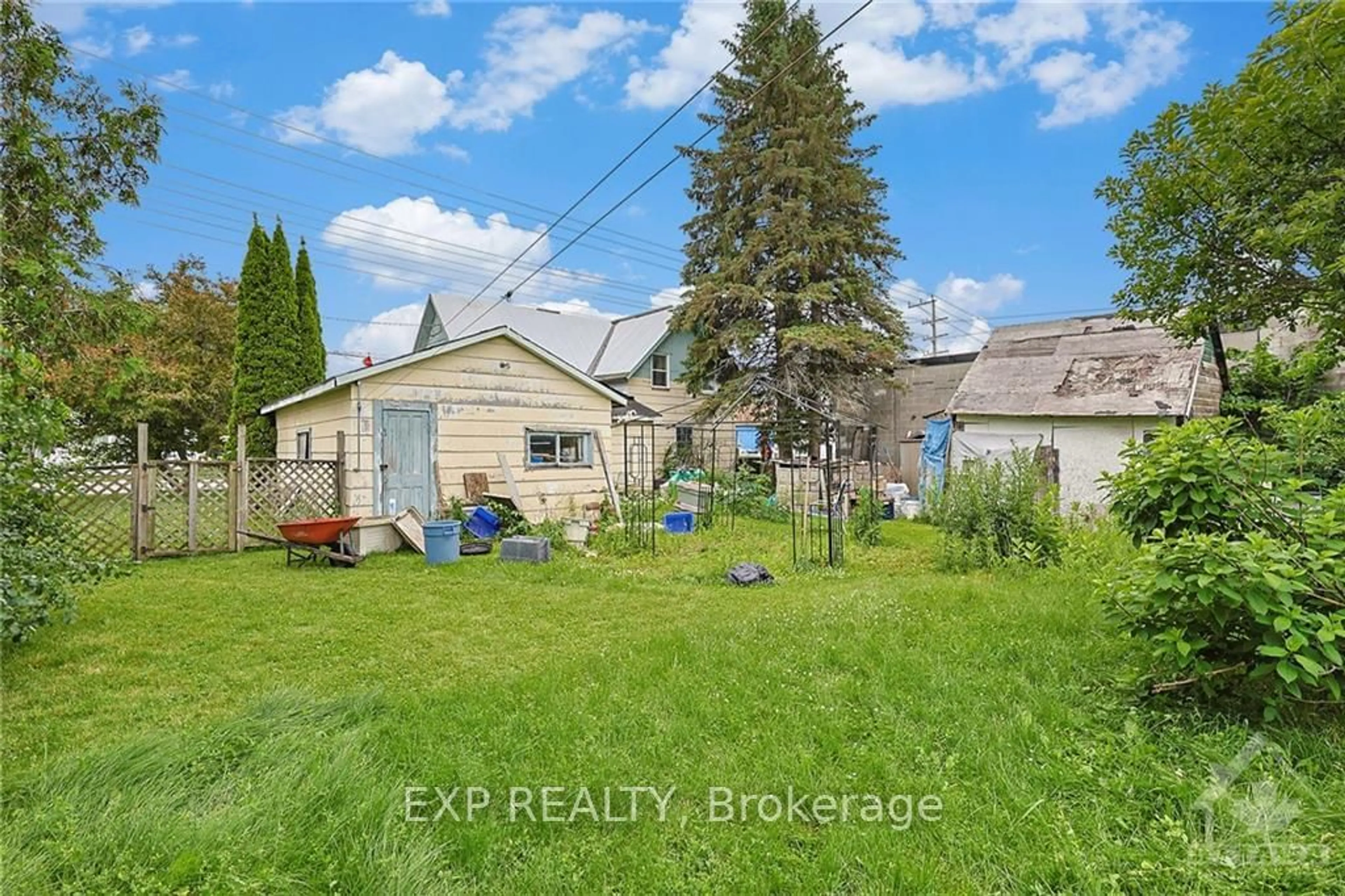 Frontside or backside of a home, the fenced backyard for 158 OTTAWA St, Mississippi Mills Ontario K0A 1A0