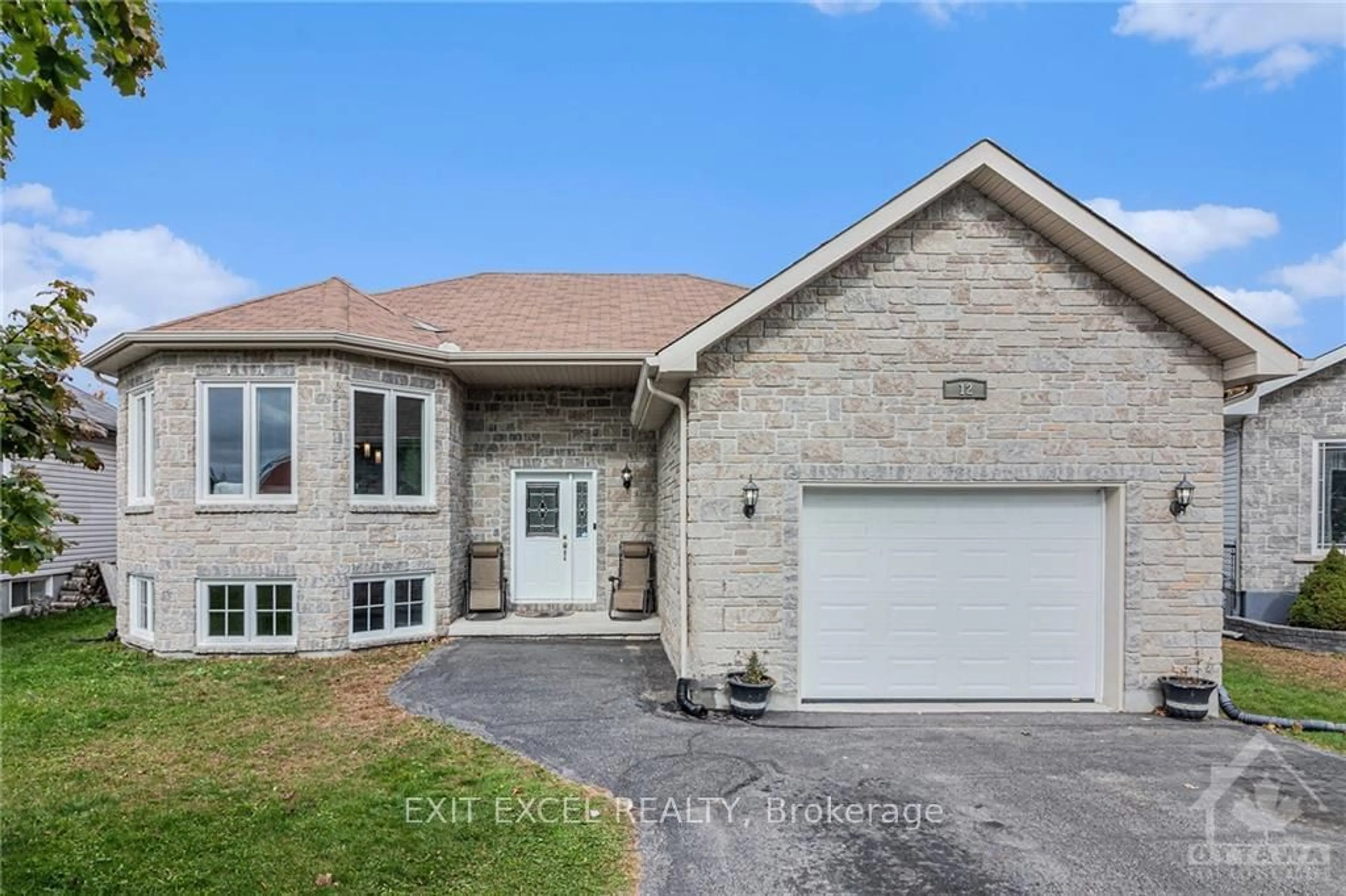 Frontside or backside of a home, the street view for 12 GIROUX St Ontario K0A 2M0