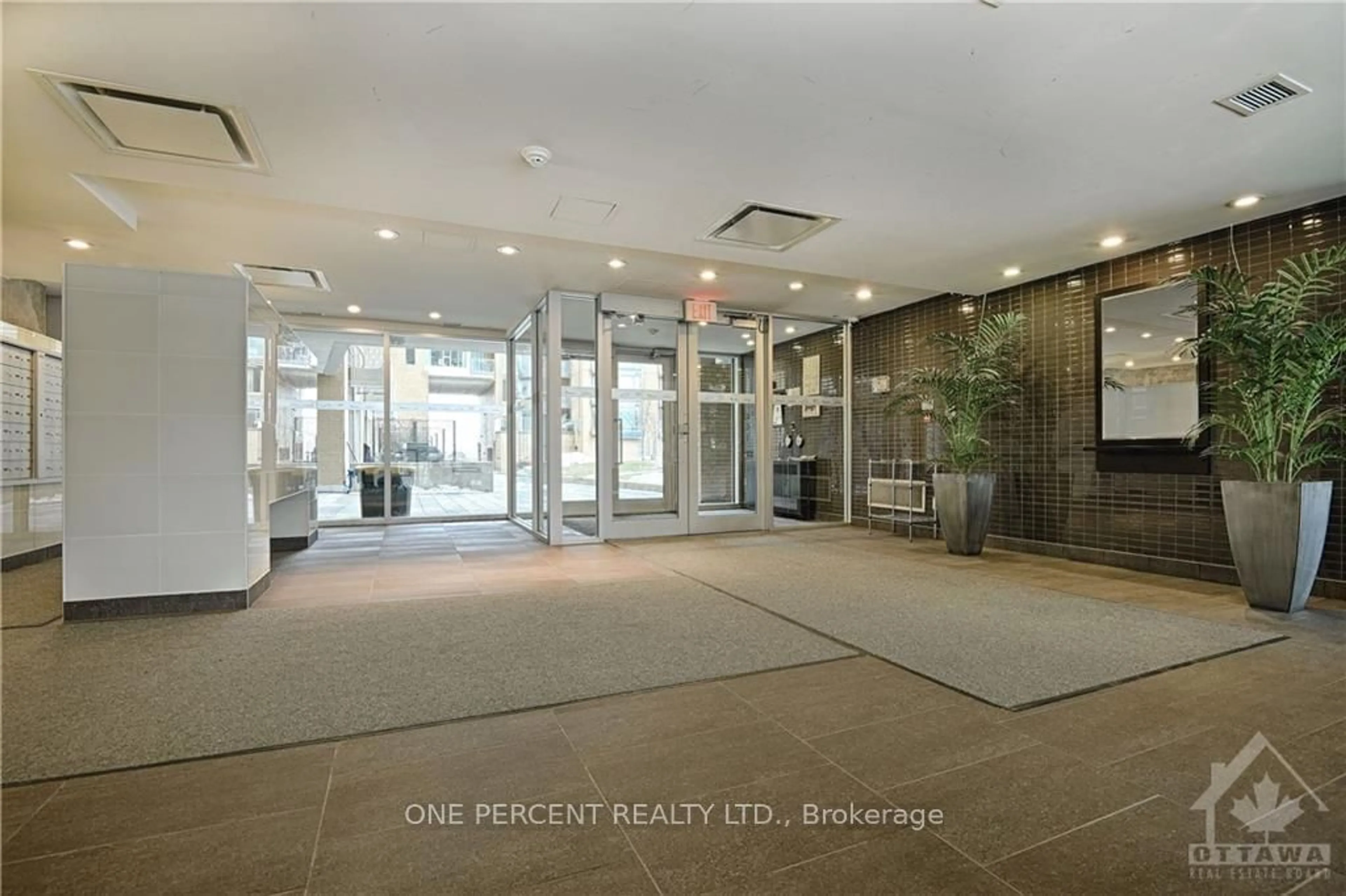 Indoor lobby, cement floor for 250 LETT St #214, West Centre Town Ontario K1R 0A8