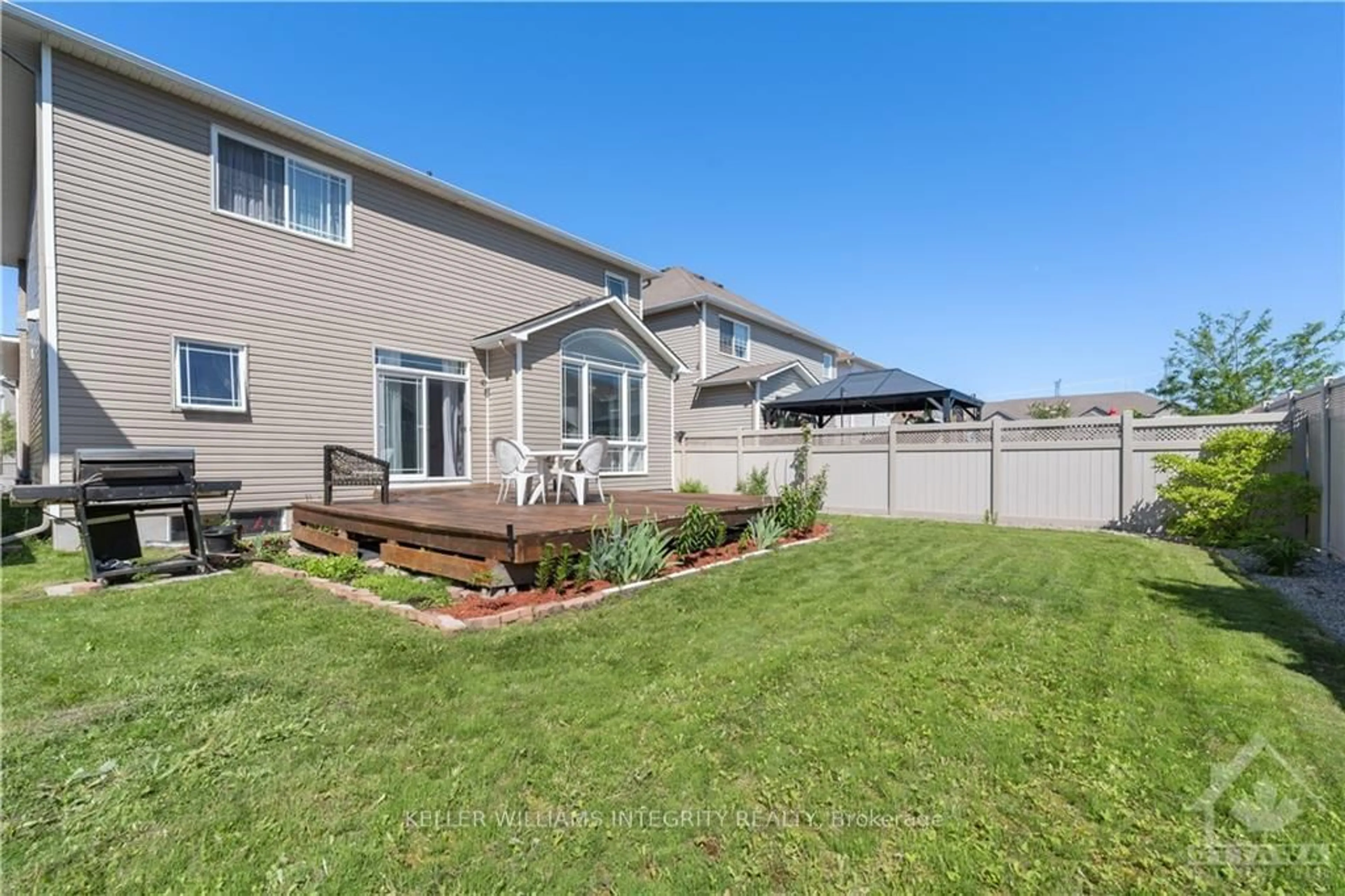 Frontside or backside of a home, the fenced backyard for 412 JUNE Crt, Orleans - Convent Glen and Area Ontario K1W 0E2