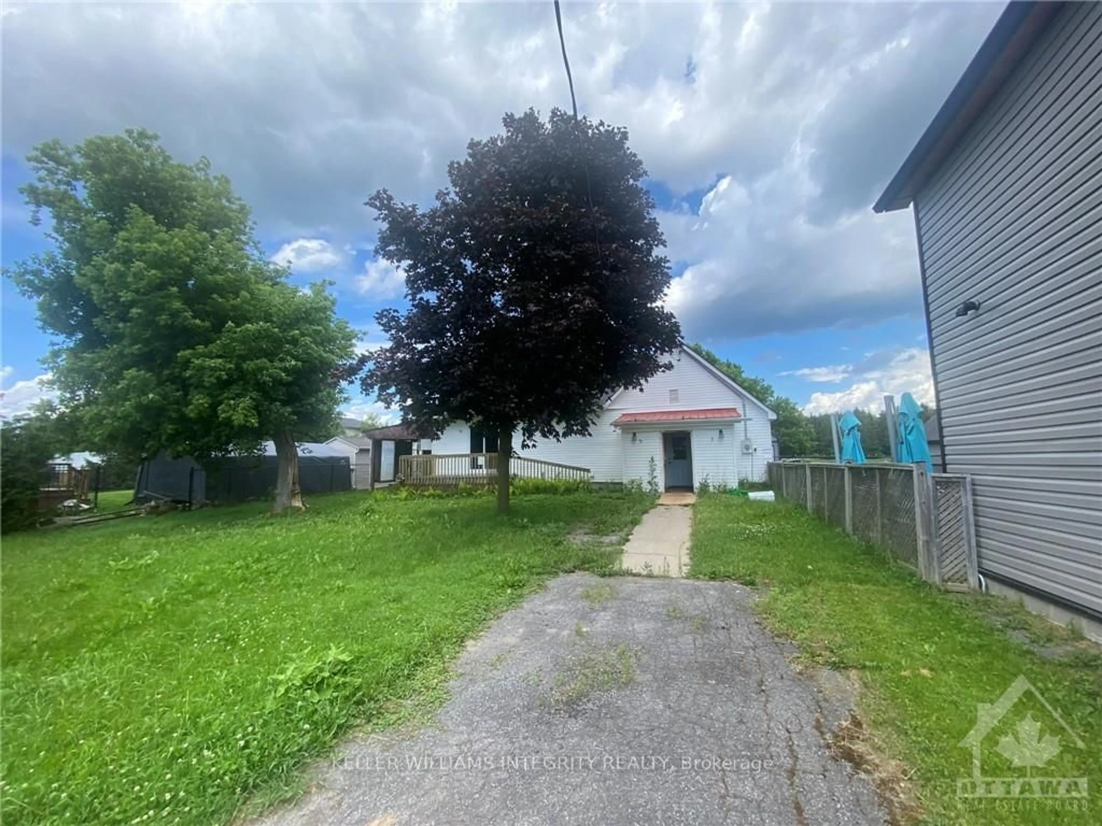 Frontside or backside of a home, the fenced backyard for 2415 DU LAC Rd, Clarence-Rockland Ontario K0A 3N0