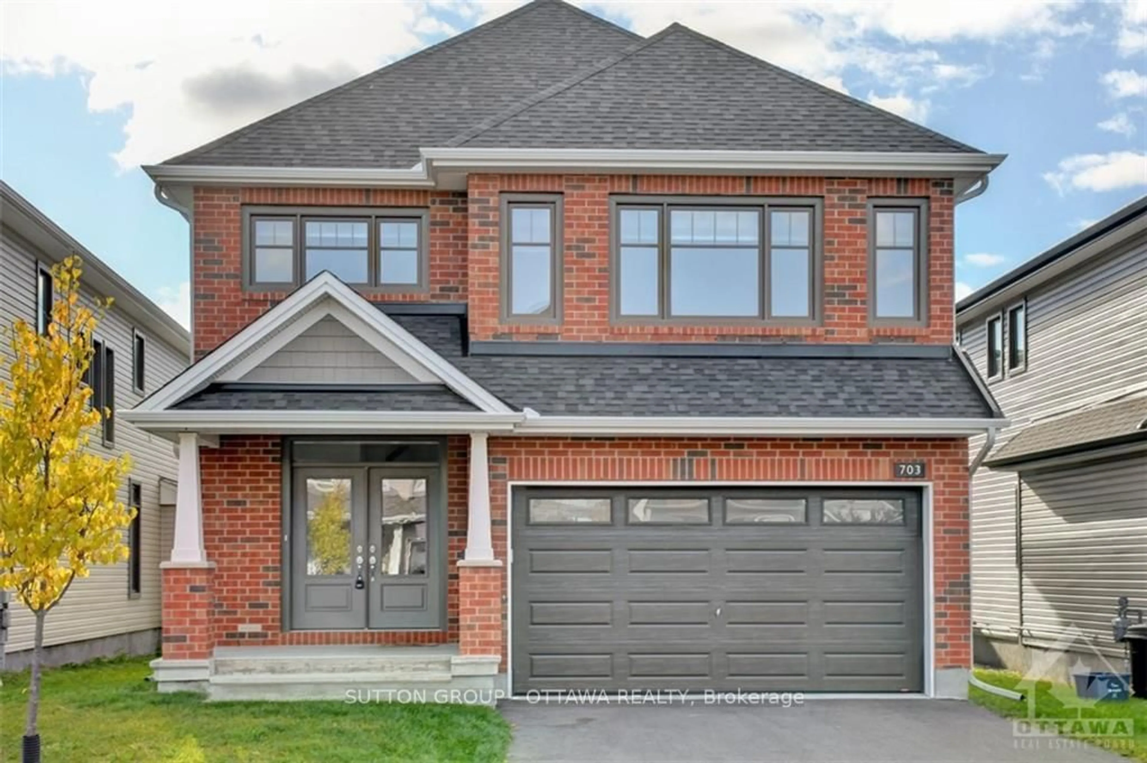 Home with brick exterior material for 703 MOONFLOWER Cres, Blossom Park - Airport and Area Ontario K1T 0S3