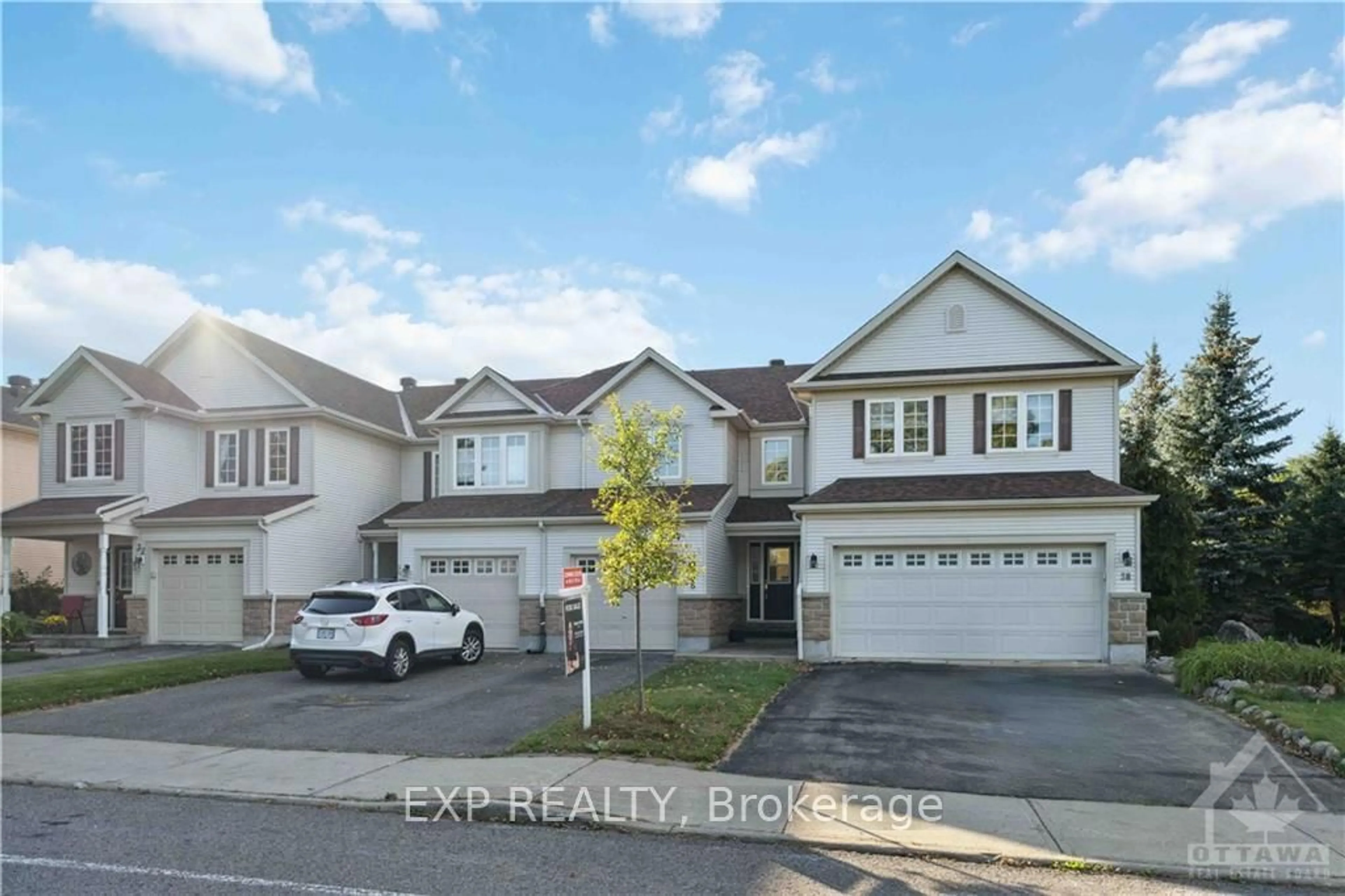 A pic from exterior of the house or condo, the street view for 36 RIVERSTONE Dr, Barrhaven Ontario K2J 4X7