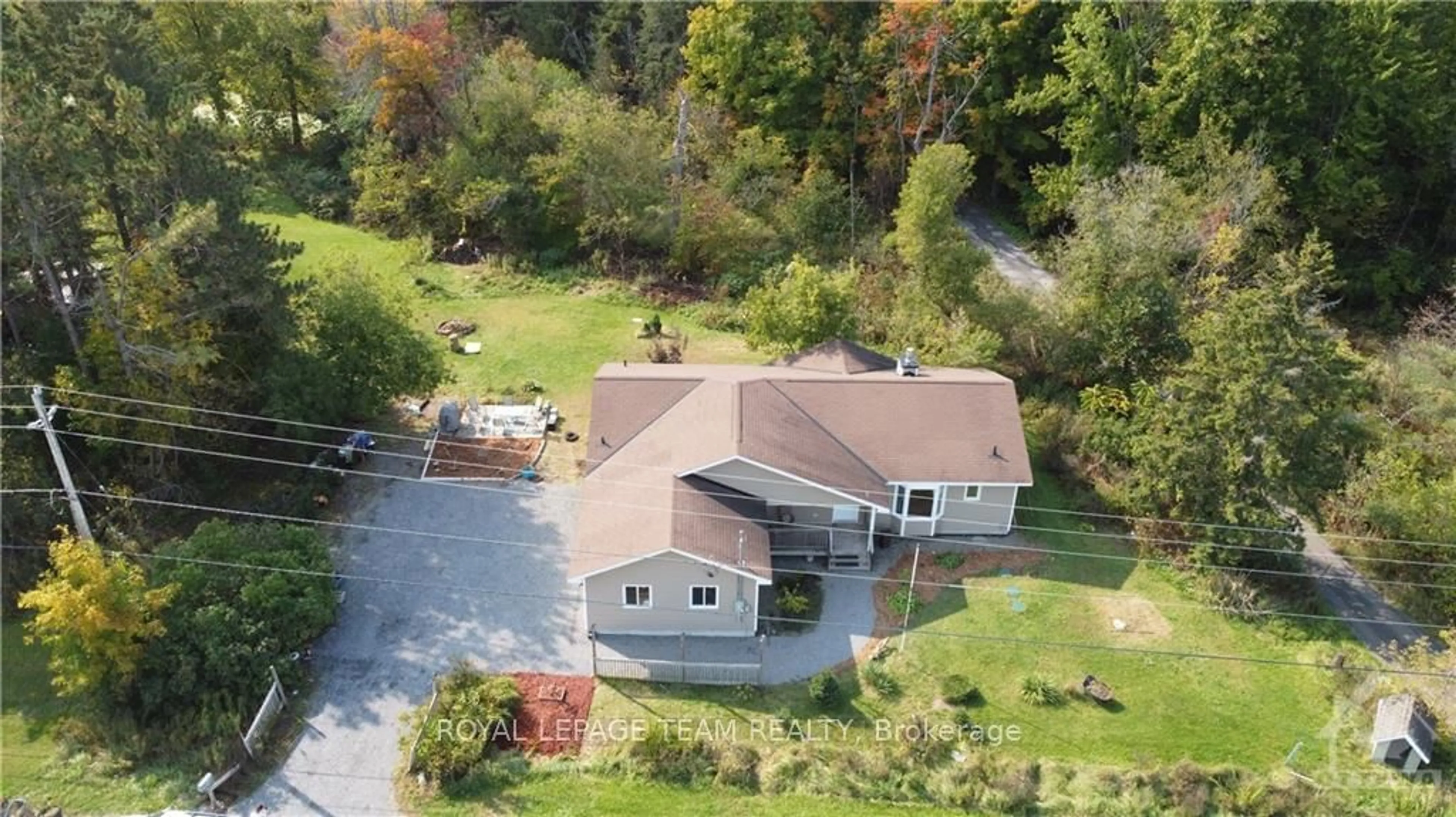 Frontside or backside of a home, cottage for 2496 RIVER Rd, Manotick - Kars - Rideau Twp and Area Ontario K4M 1B4