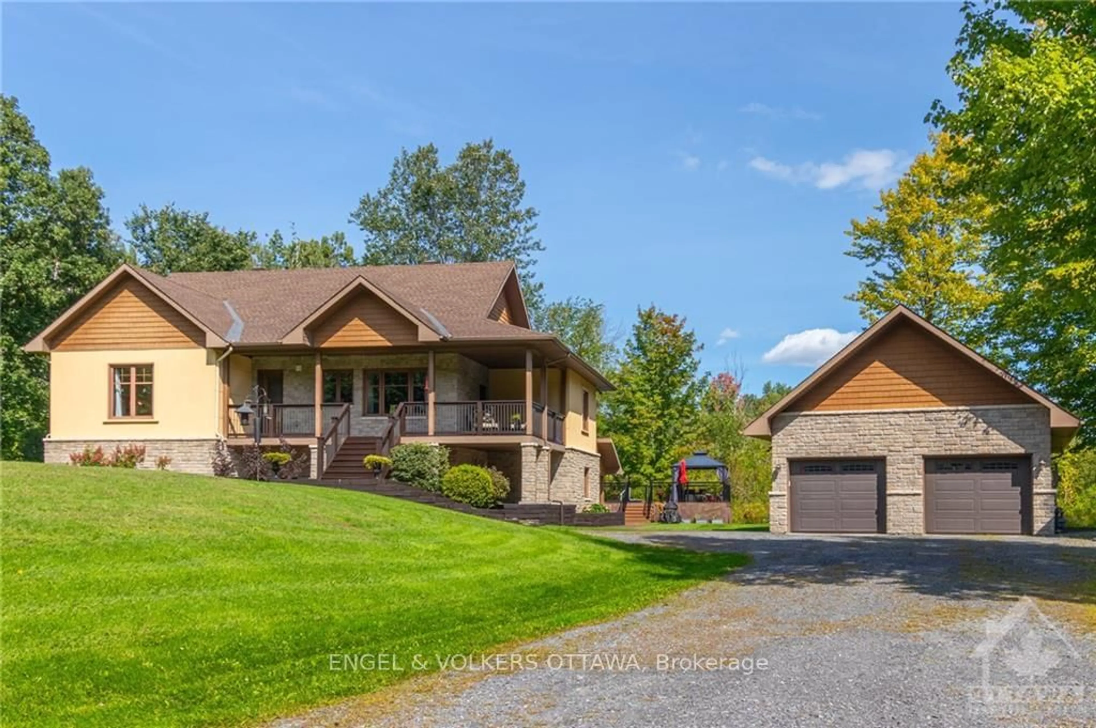 Frontside or backside of a home, cottage for 2450 RIVER Rd, Manotick - Kars - Rideau Twp and Area Ontario K4M 1B4