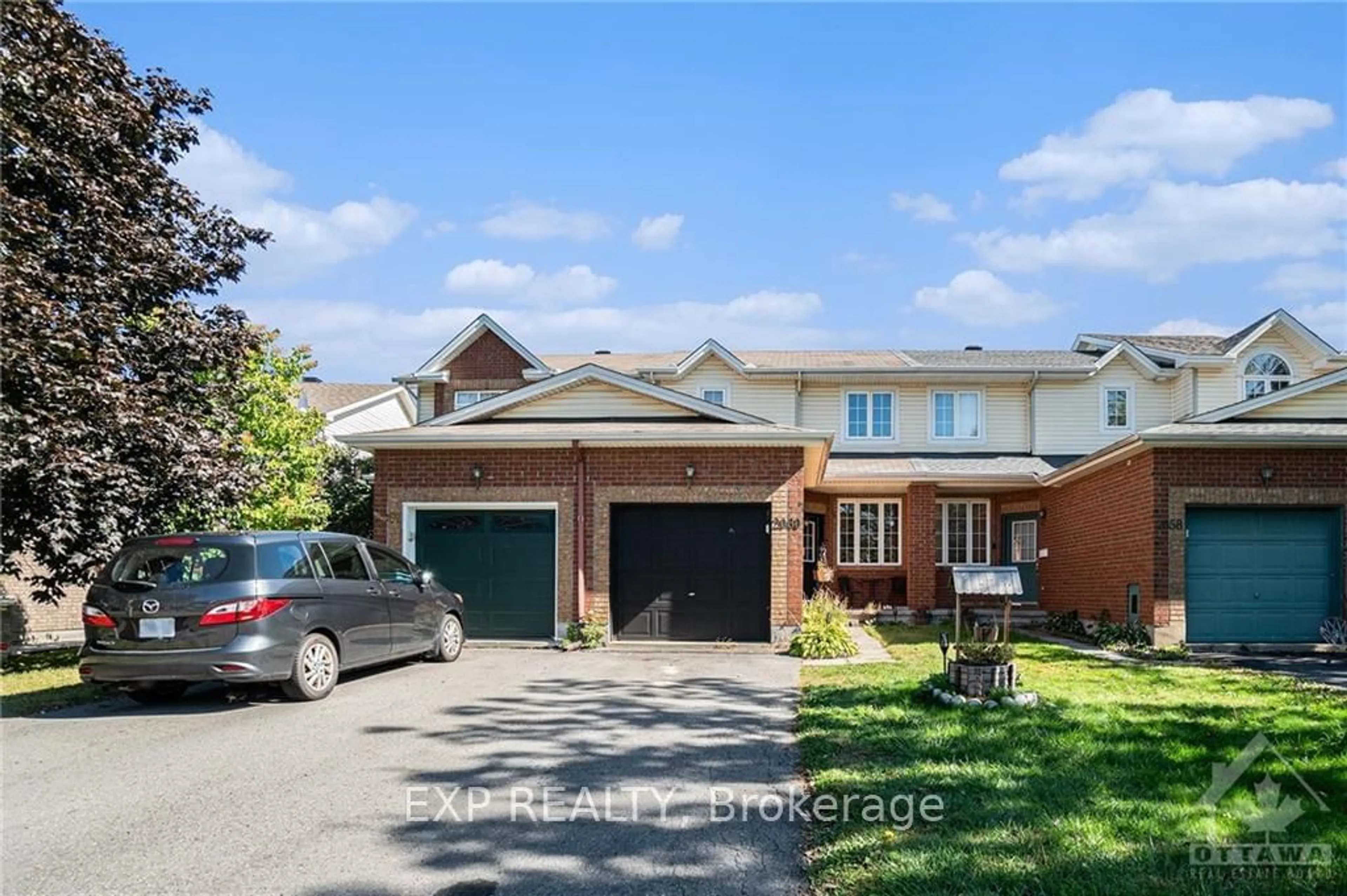 Frontside or backside of a home, the street view for 2060 SCULLY Way, Orleans - Cumberland and Area Ontario K4A 4L9