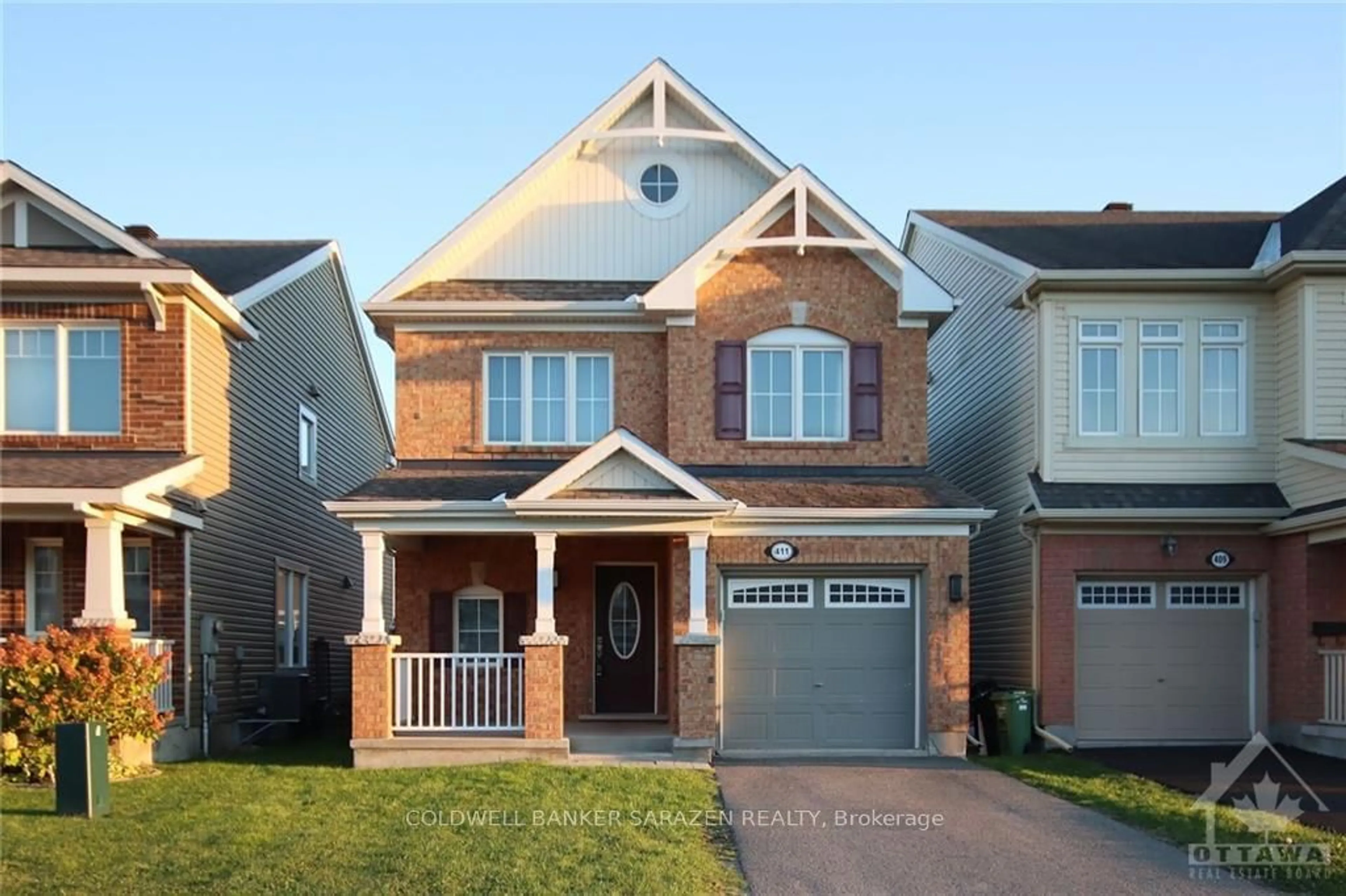 Home with brick exterior material for 411 MEADOWHAWK Cres, Barrhaven Ontario K2J 5X1