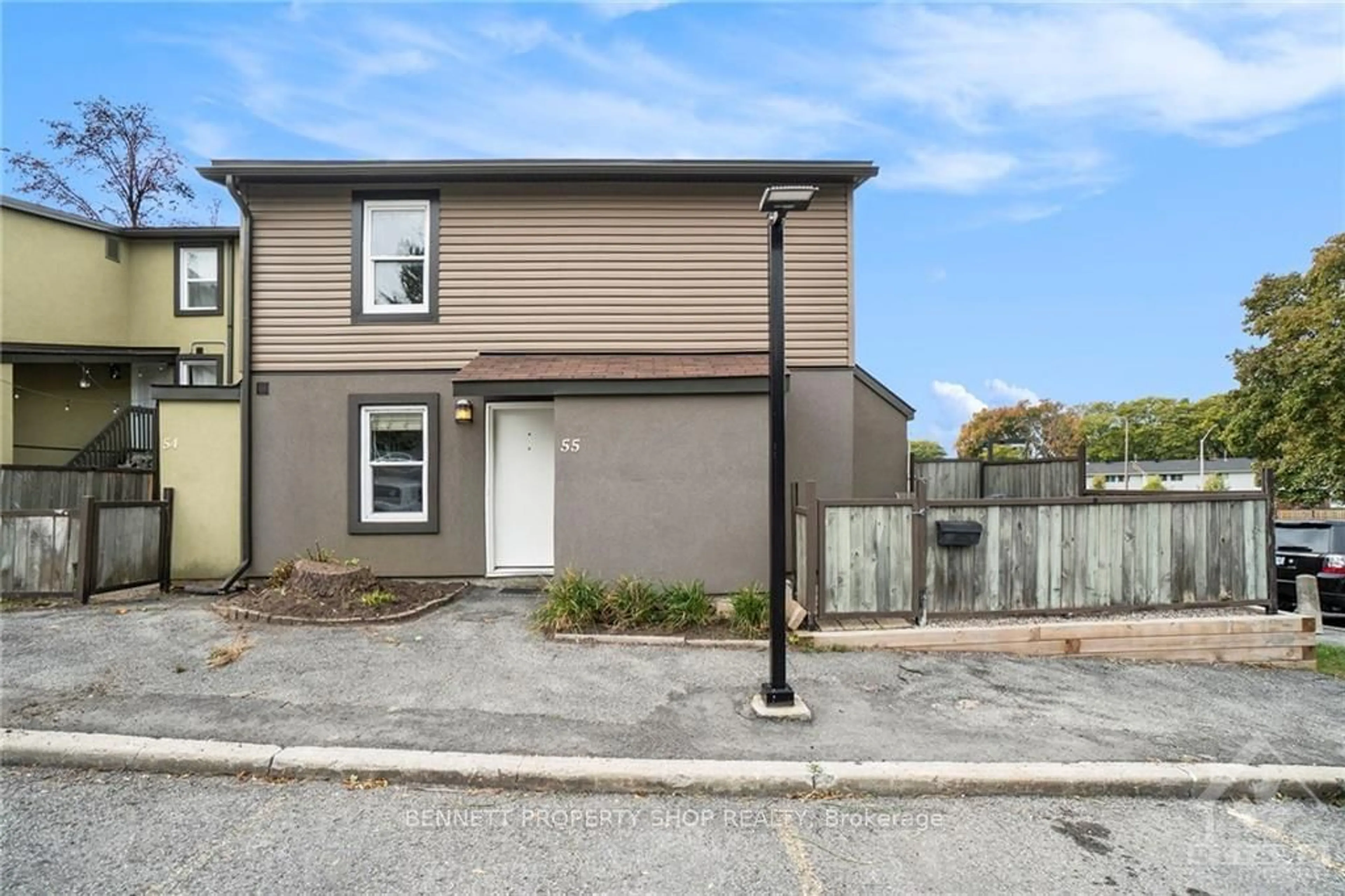 A pic from exterior of the house or condo, the fenced backyard for 1250 MCWATTERS Rd #55, Parkway Park - Queensway Terrace S and Area Ontario K2C 3P5