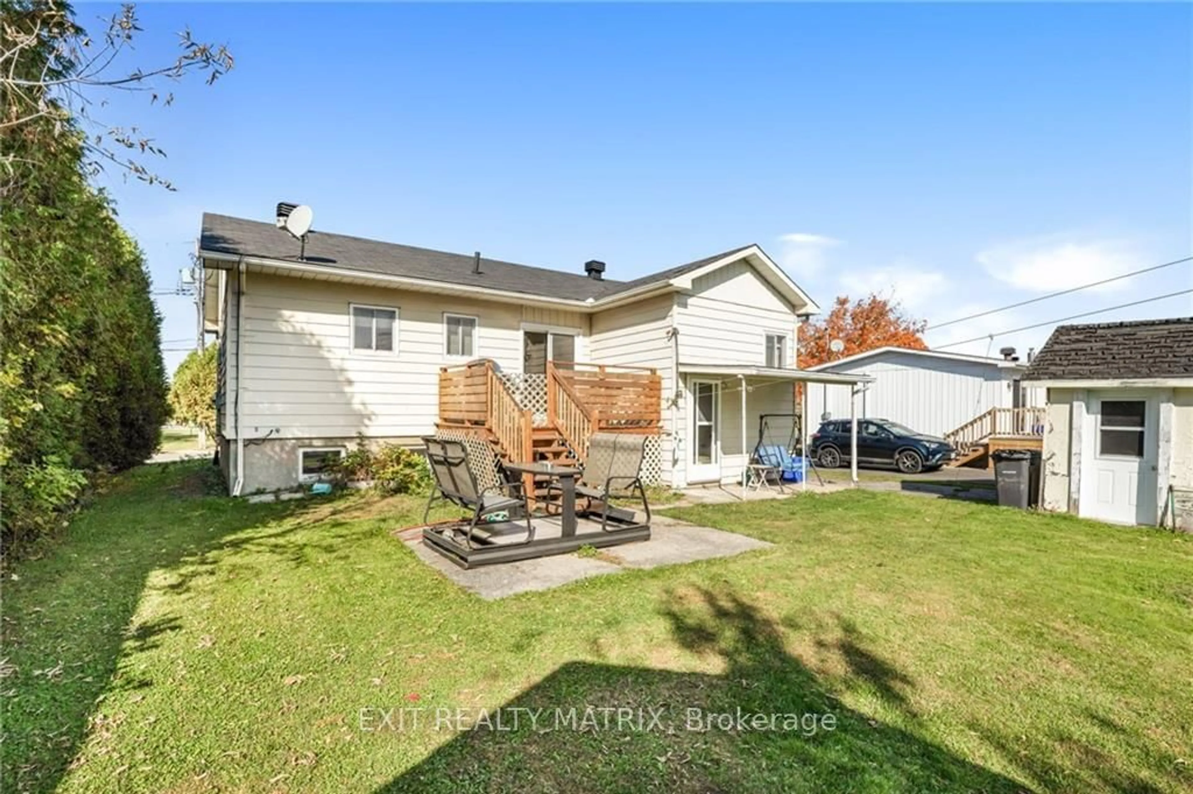 Frontside or backside of a home, the fenced backyard for 945 QUEEN St, Champlain Ontario K0B 1K0