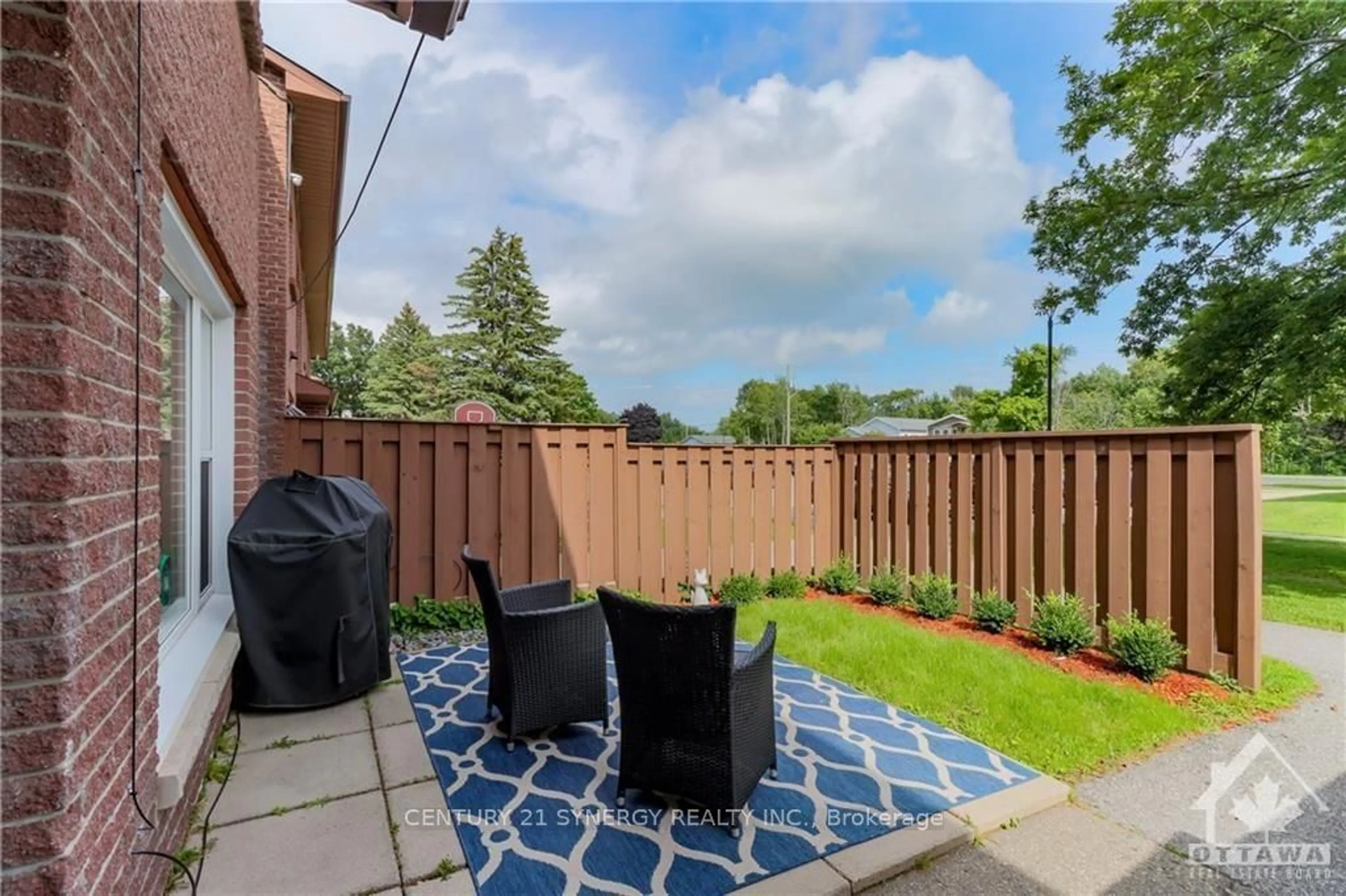 Patio, the fenced backyard for 4 PEARL St #E, Smiths Falls Ontario K7A 5B5