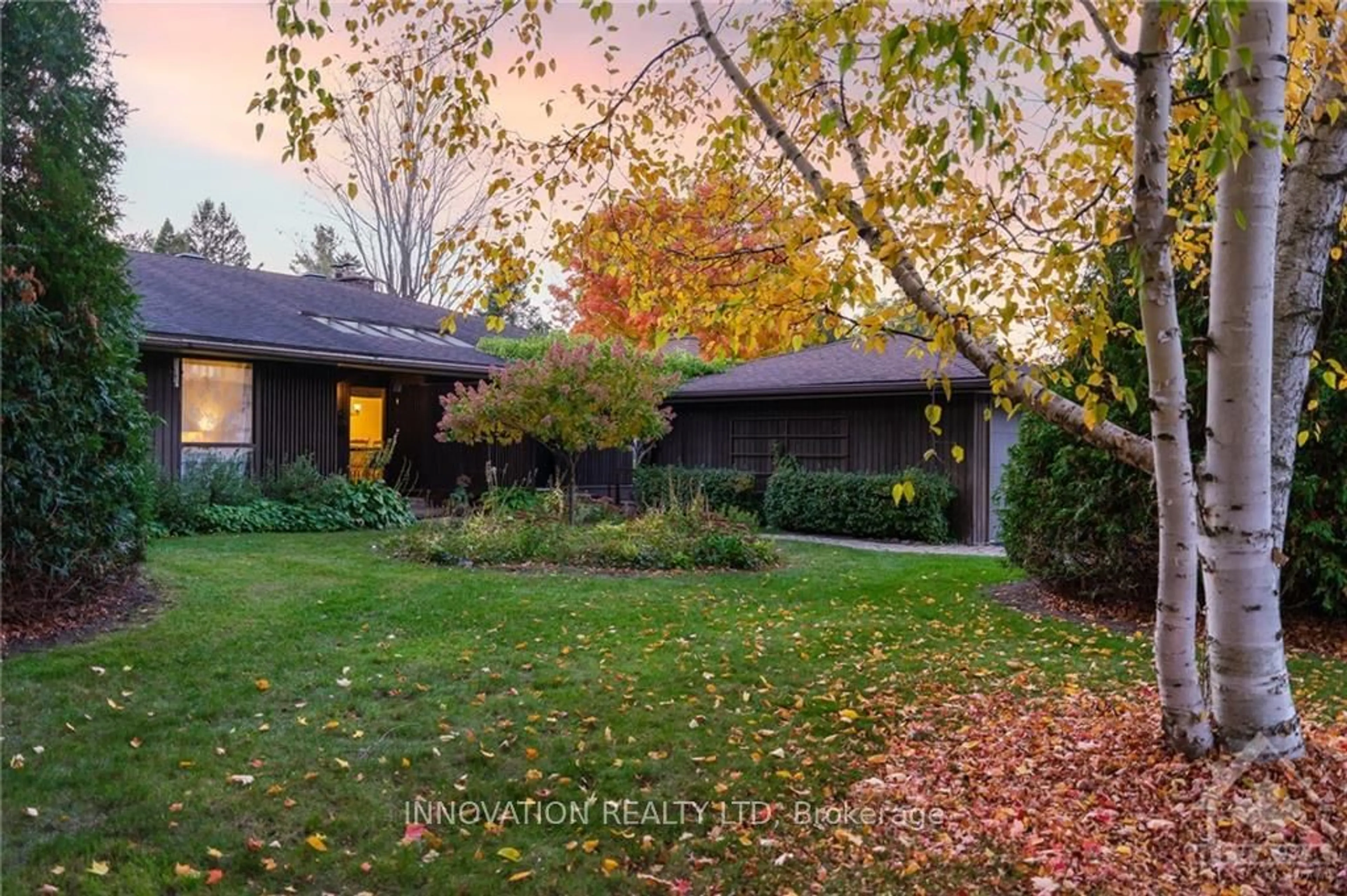 Frontside or backside of a home, the fenced backyard for 52 THE Pkwy, Kanata Ontario K2K 1S9