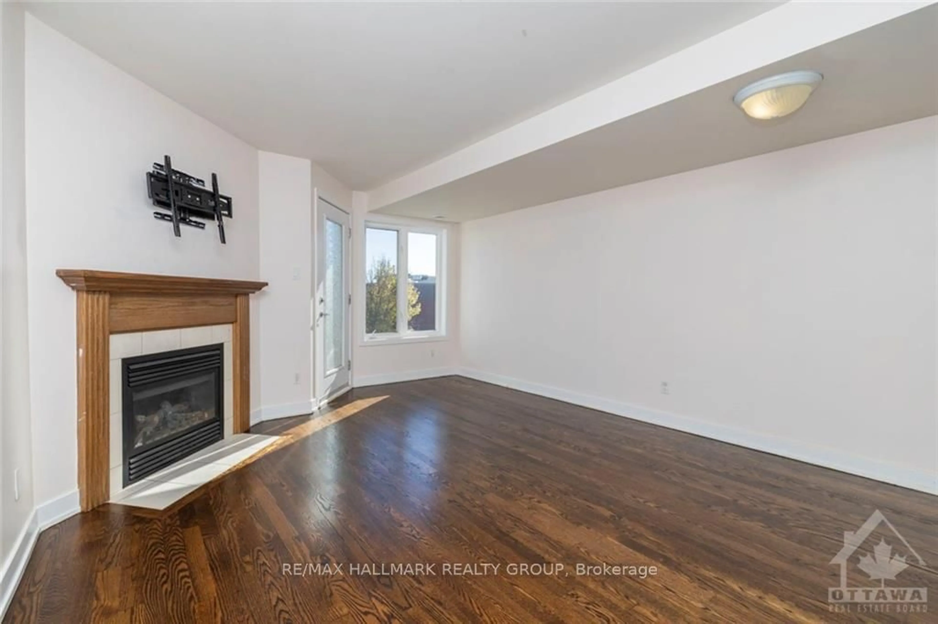 Living room, wood floors for 4524 INNES Rd #C, Orleans - Cumberland and Area Ontario K4A 0X5