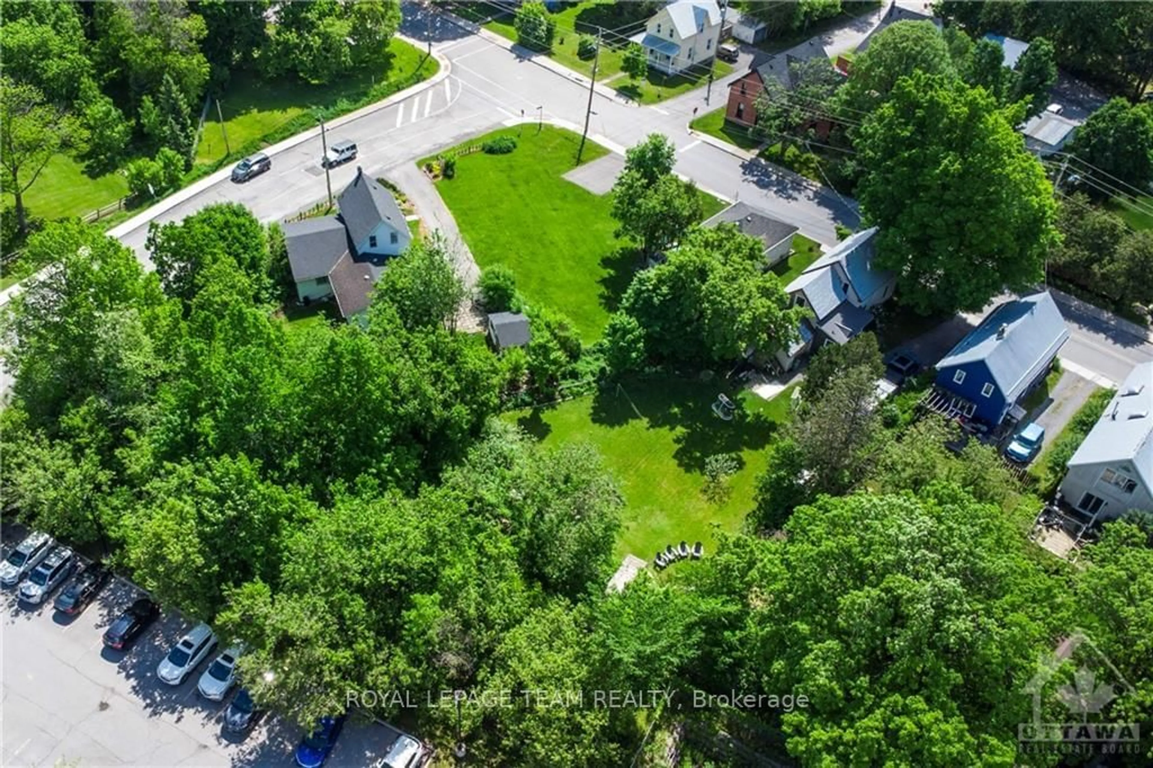 A pic from exterior of the house or condo, the fenced backyard for 105 LANGSTAFF Dr, Carp - Huntley Ward Ontario K0A 1L0