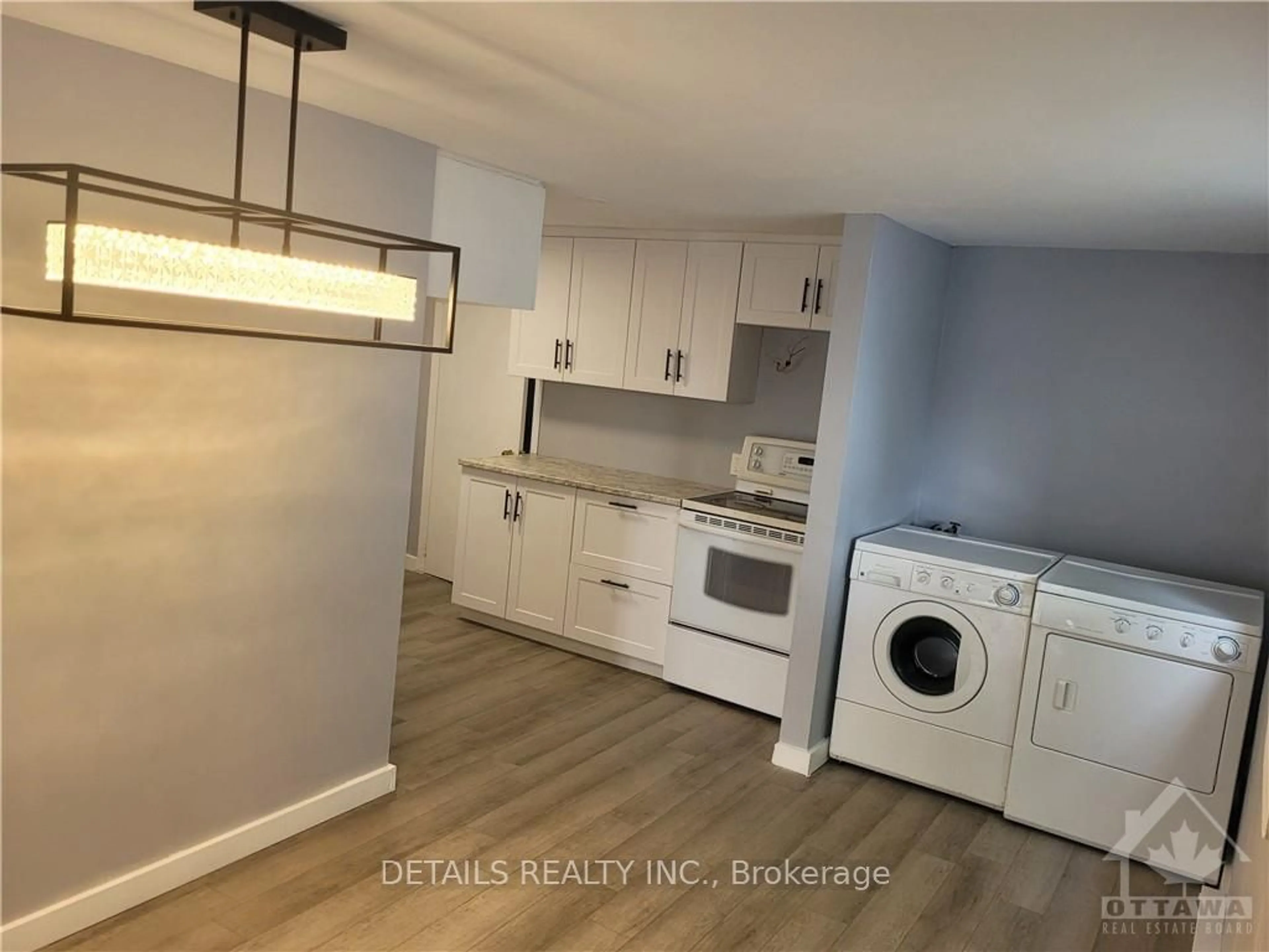 Kitchen with laundary machines, wood floors for 4559 STE CATHERINE St, The Nation Ontario K0C 2B0