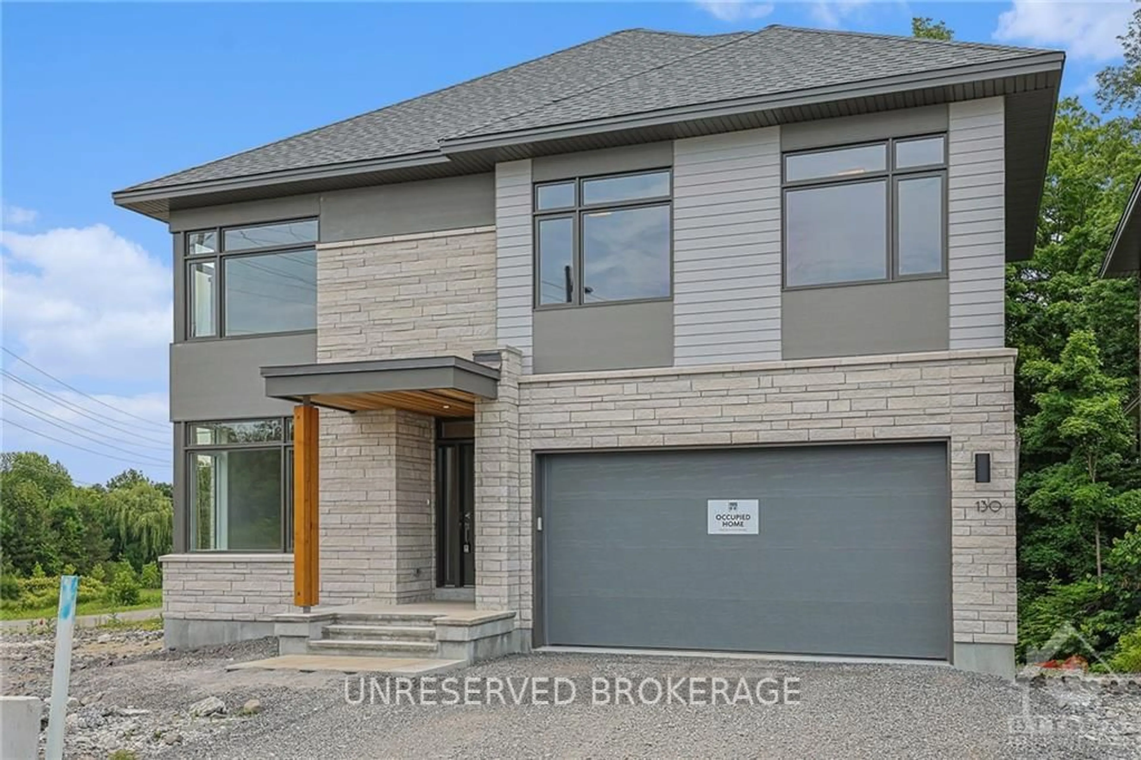 Frontside or backside of a home, the street view for 130 IRON BRIDGE Pl, Kanata Ontario K0A 1L0