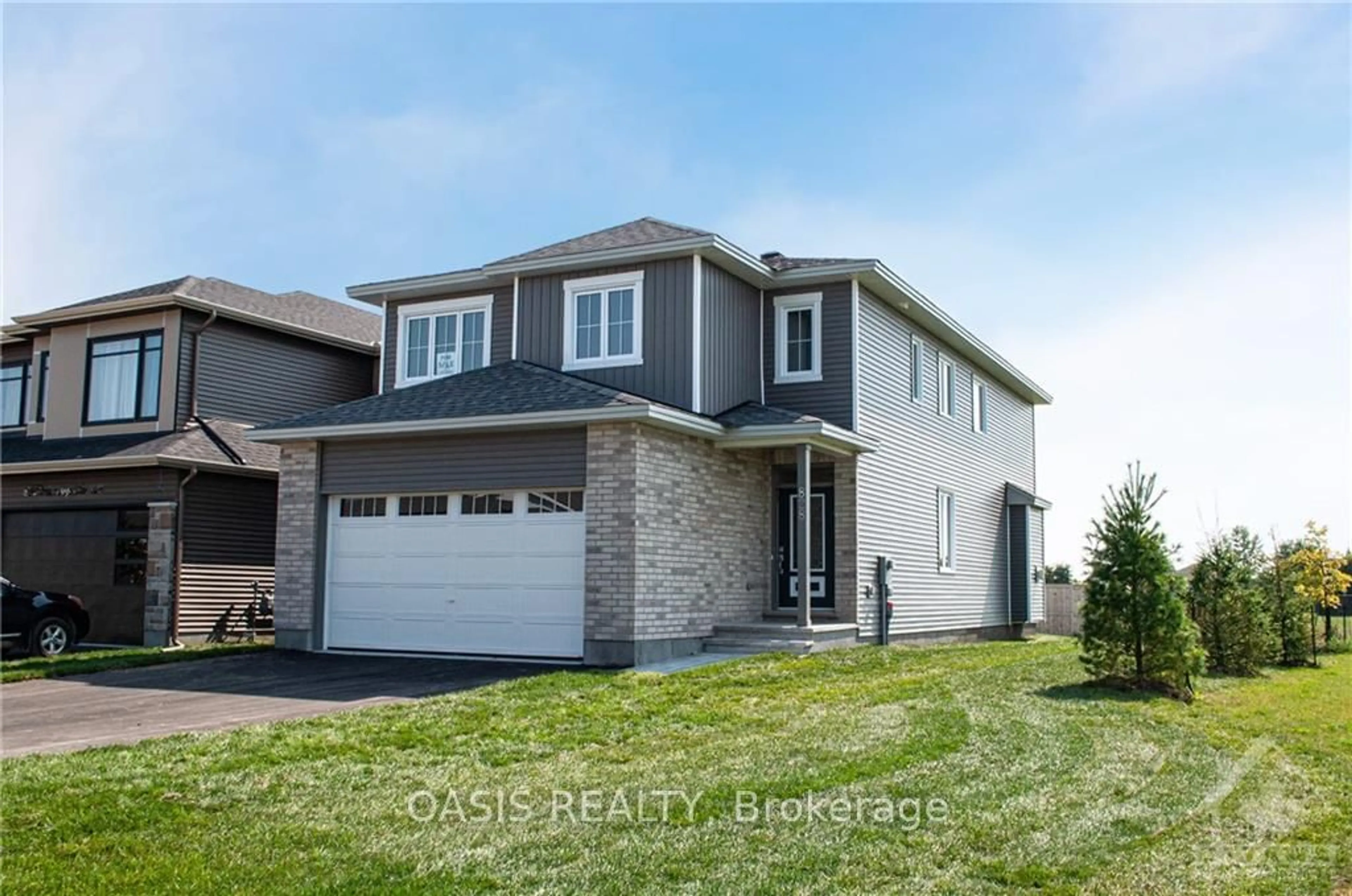 Frontside or backside of a home, the street view for 828 SNOWDROP Cres, Blossom Park - Airport and Area Ontario K1T 0X7