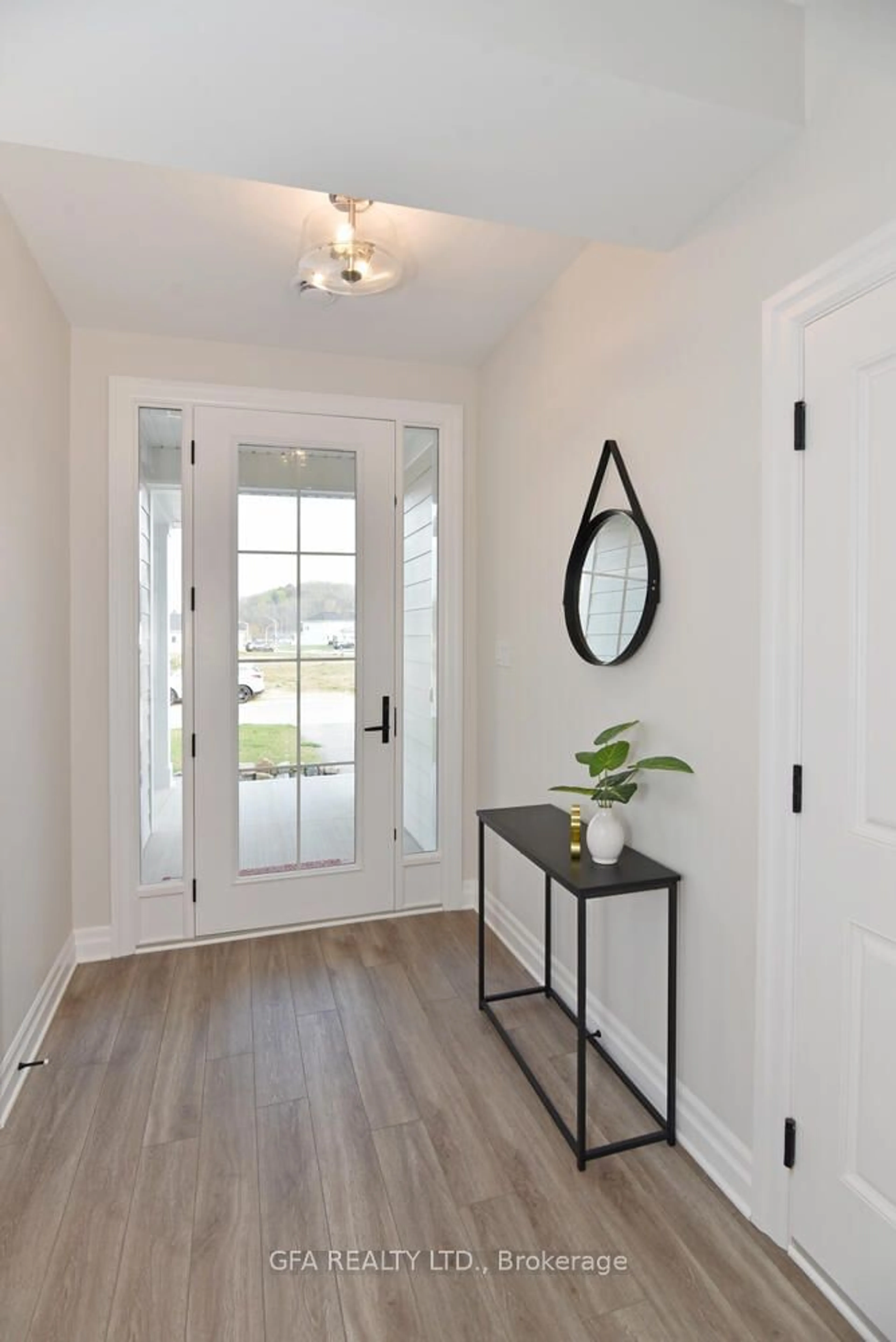 Indoor entryway, wood floors for 403 Breakwater Blvd, Central Elgin Ontario N5L 0B5