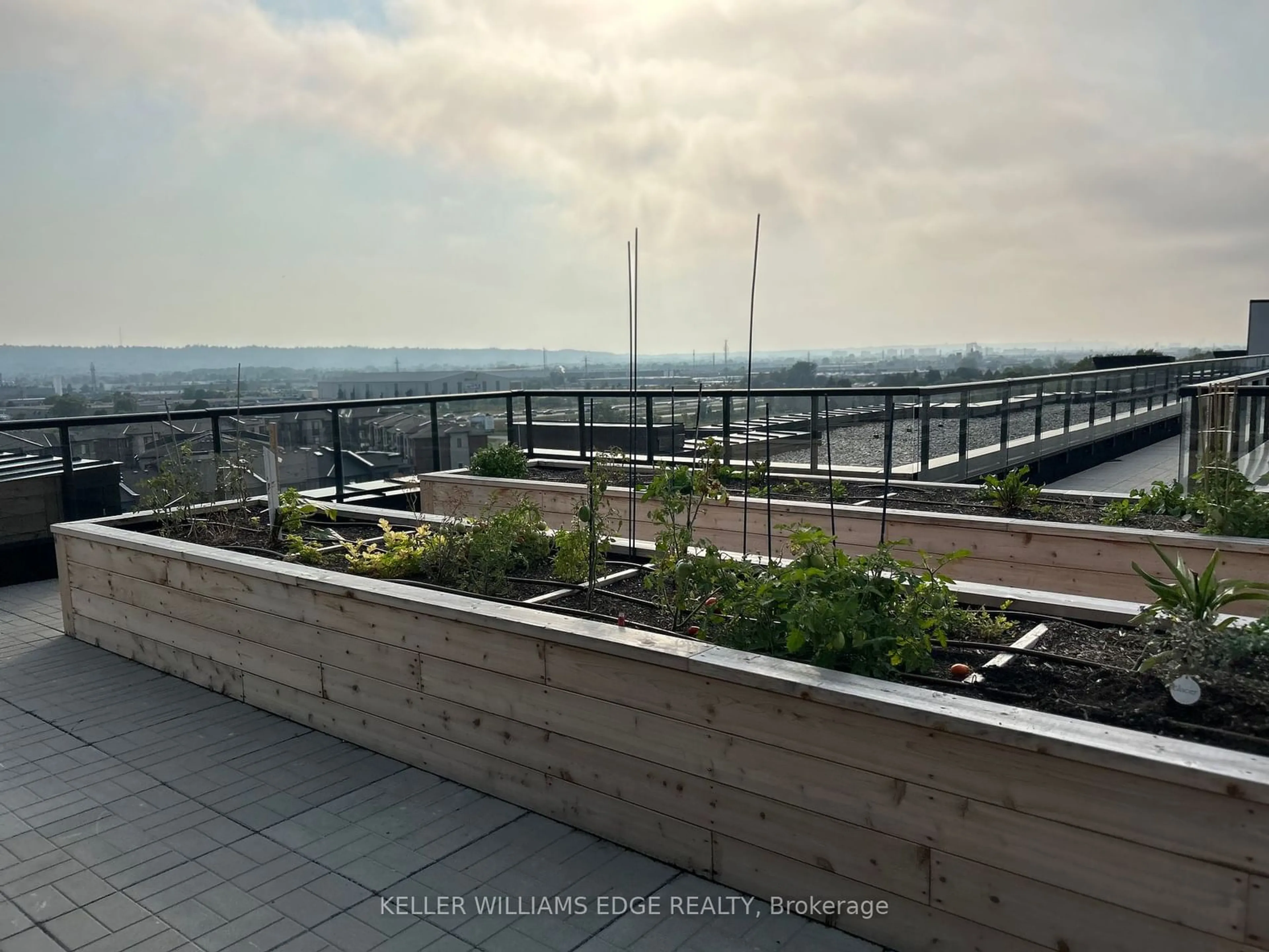 Balcony in the apartment, the view of city buildings for 600 North Service Rd #109, Hamilton Ontario L8E 5A7