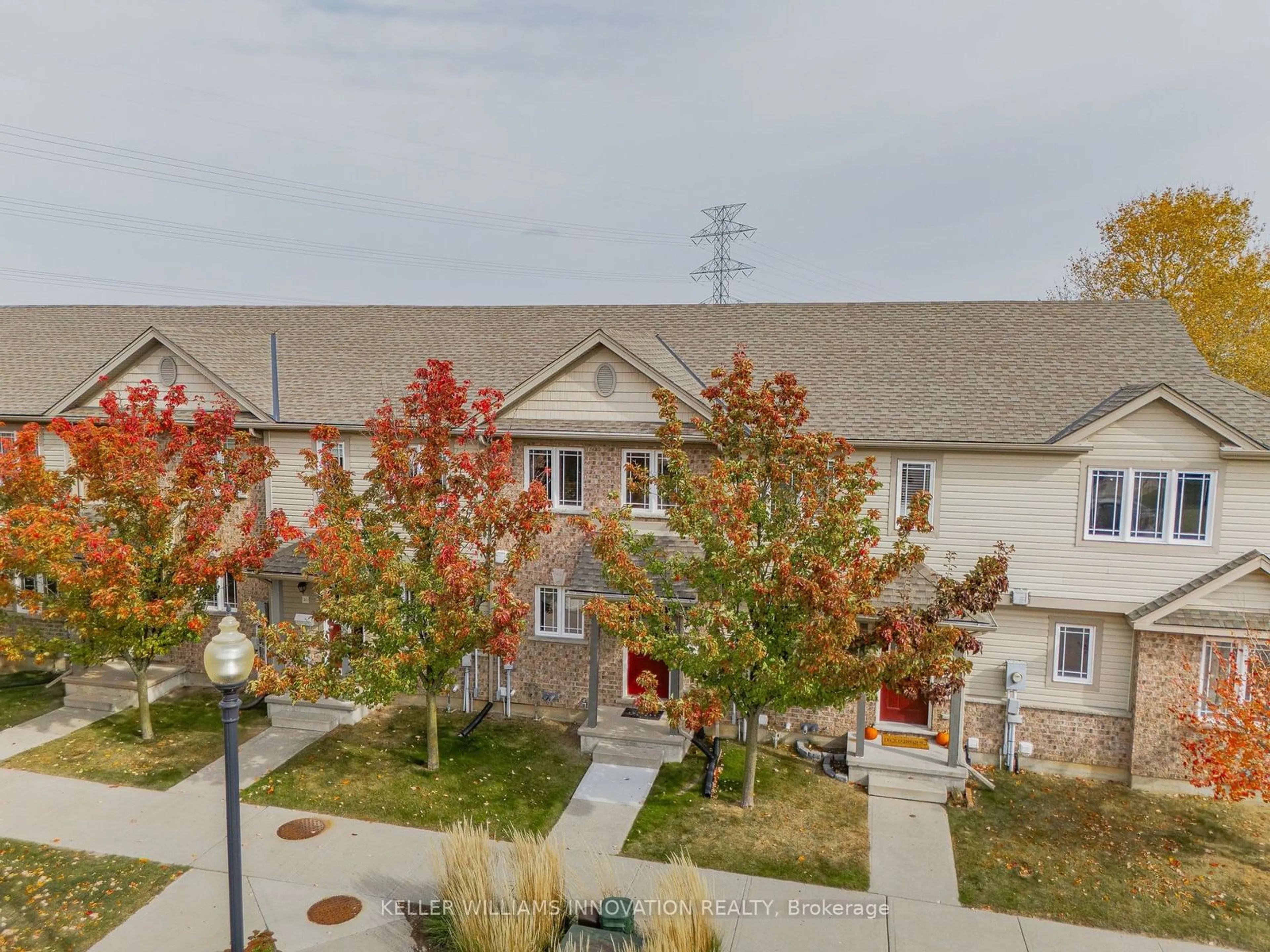 A pic from exterior of the house or condo, the street view for 535 Windflower Cres #50, Kitchener Ontario N2E 4L7