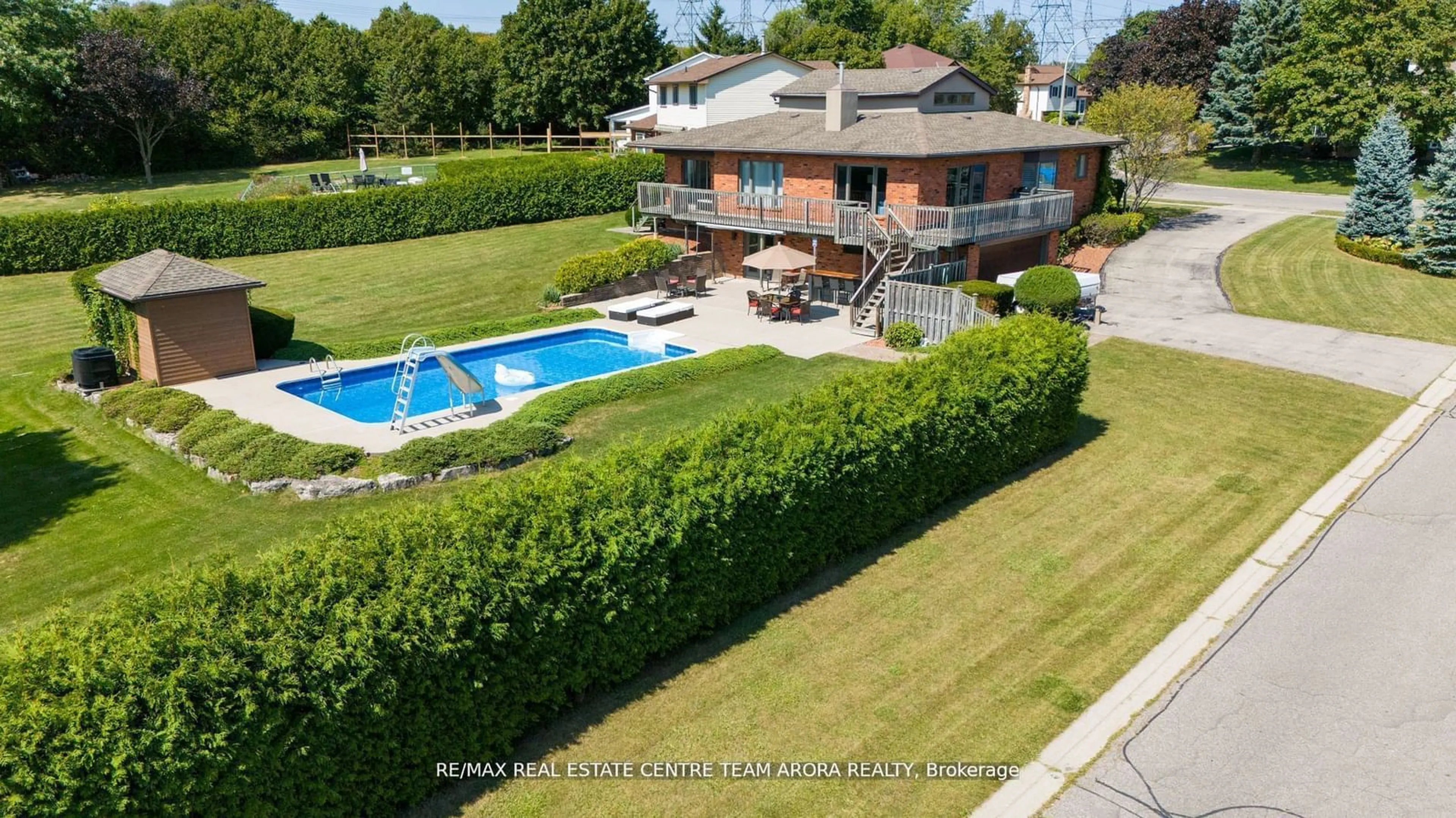 Frontside or backside of a home, the fenced backyard for 73 Williamson Dr, Haldimand Ontario N3W 1A4