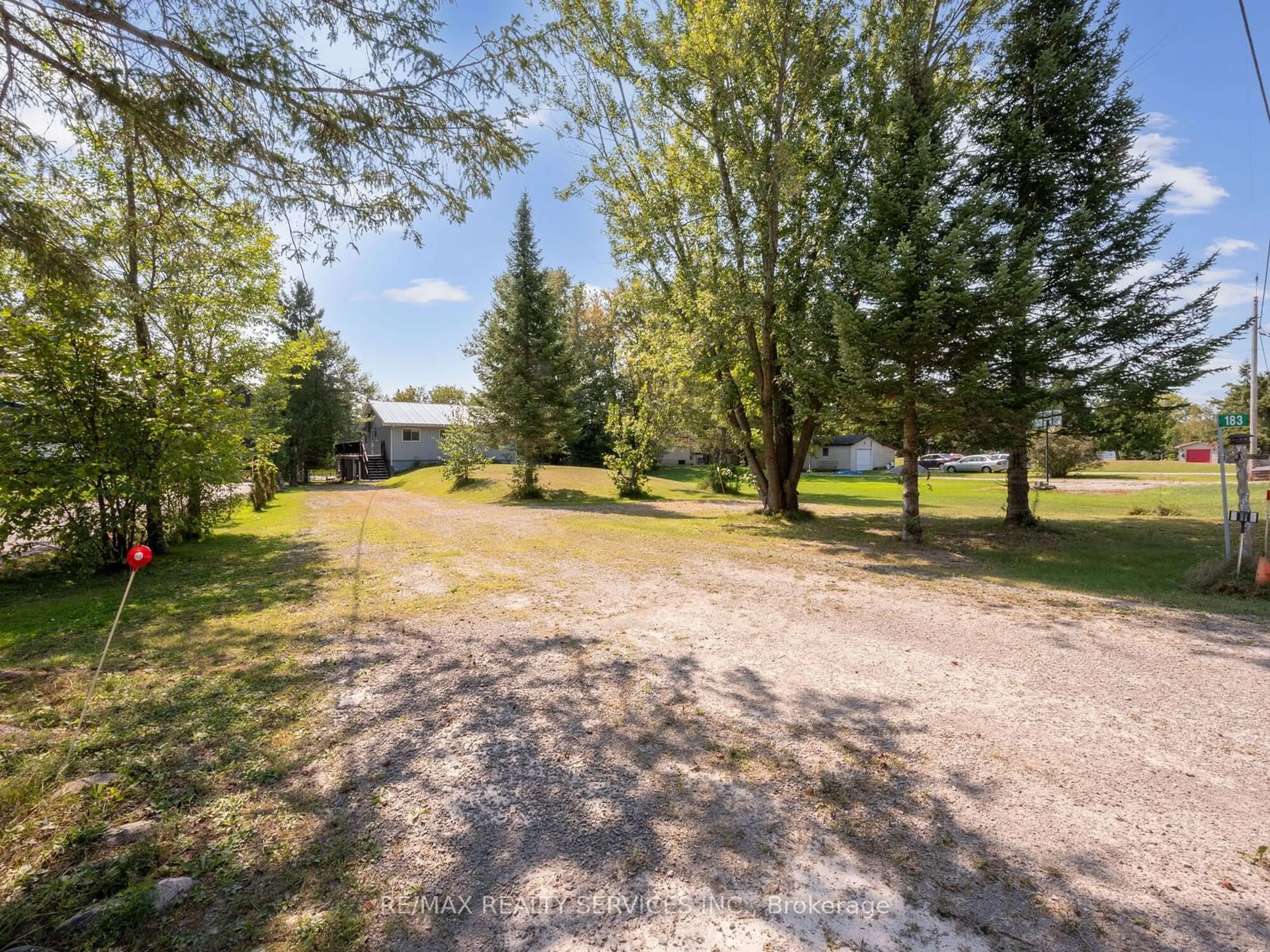 Patio, the fenced backyard for 183 McGuire Beach Rd, Kawartha Lakes Ontario K0M 2B0