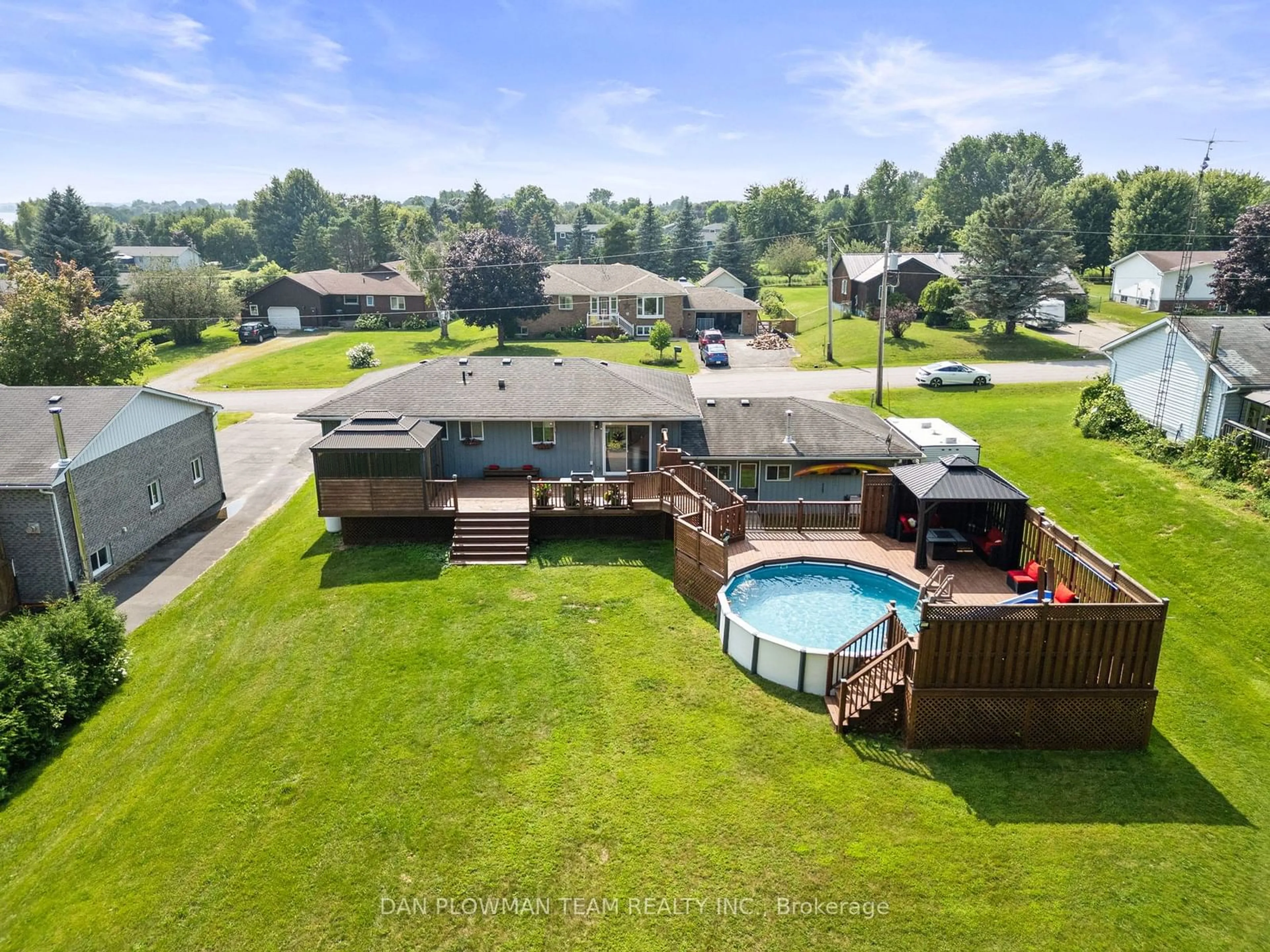 Frontside or backside of a home, the fenced backyard for 15 Sparrow Crt, Kawartha Lakes Ontario K0M 2C0