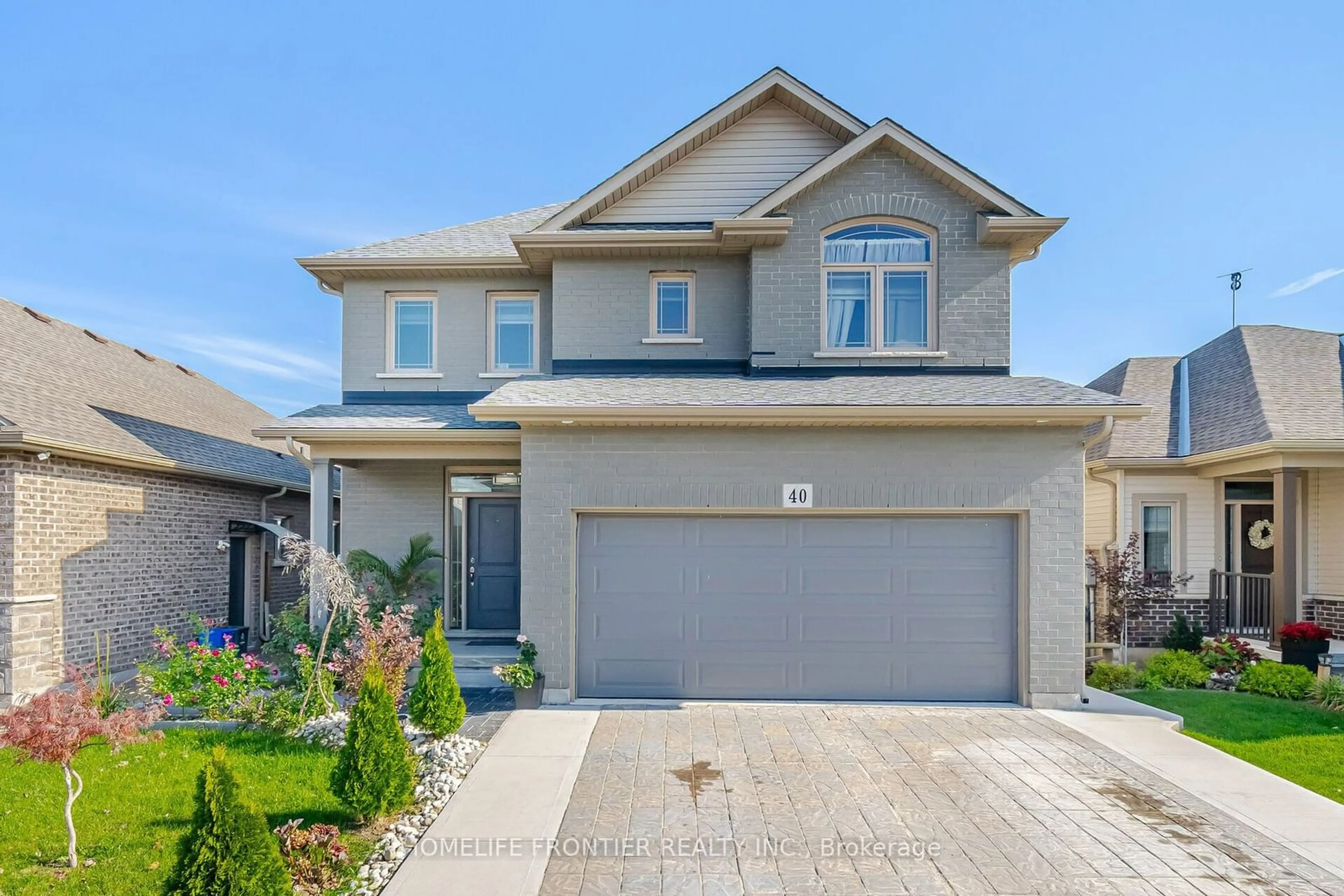 Frontside or backside of a home, the street view for 40 Berkshire Dr, St. Catharines Ontario L2M 0C2