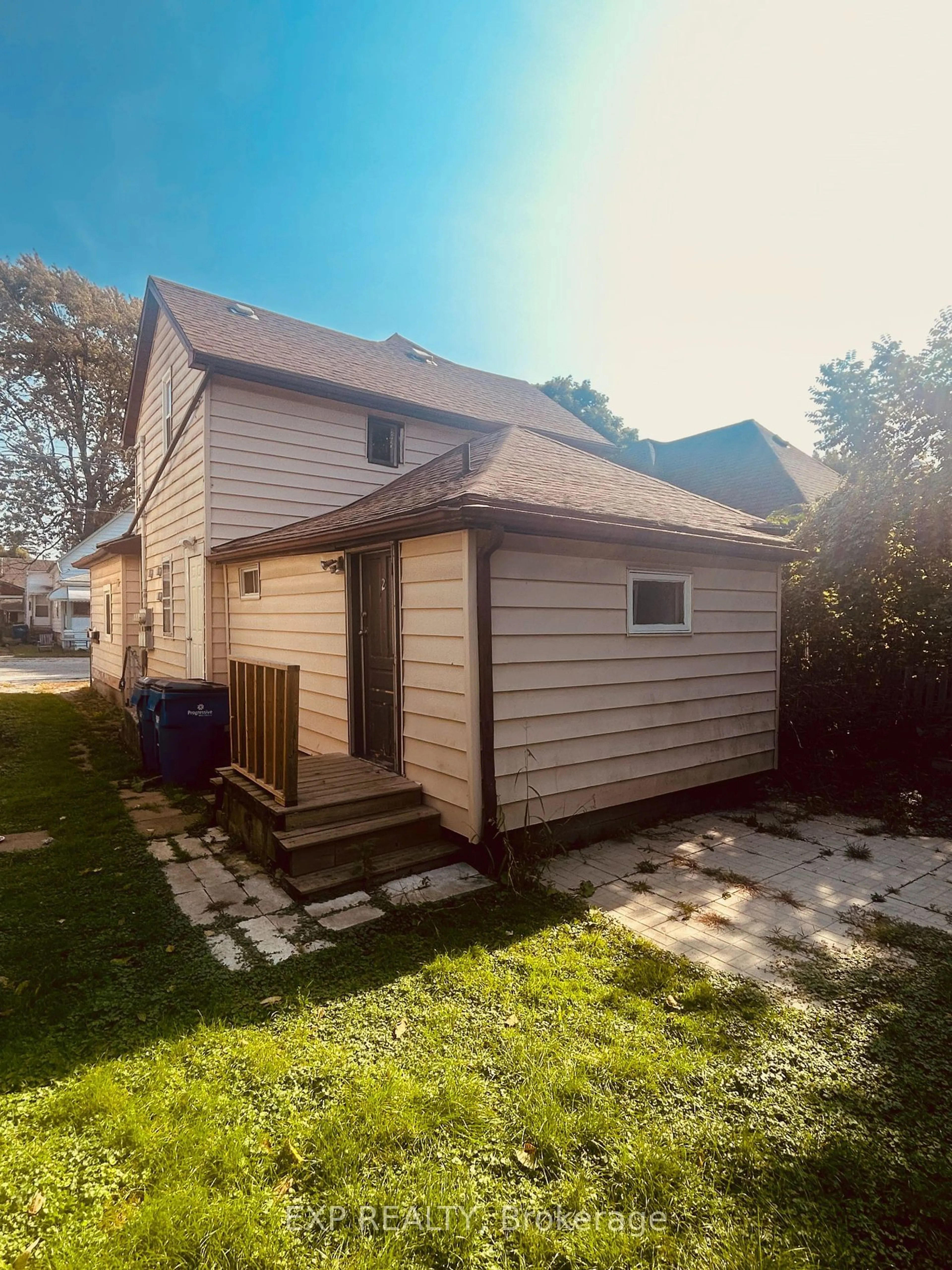 Frontside or backside of a home, the fenced backyard for 14 St George St, Chatham-Kent Ontario N7M 4P2