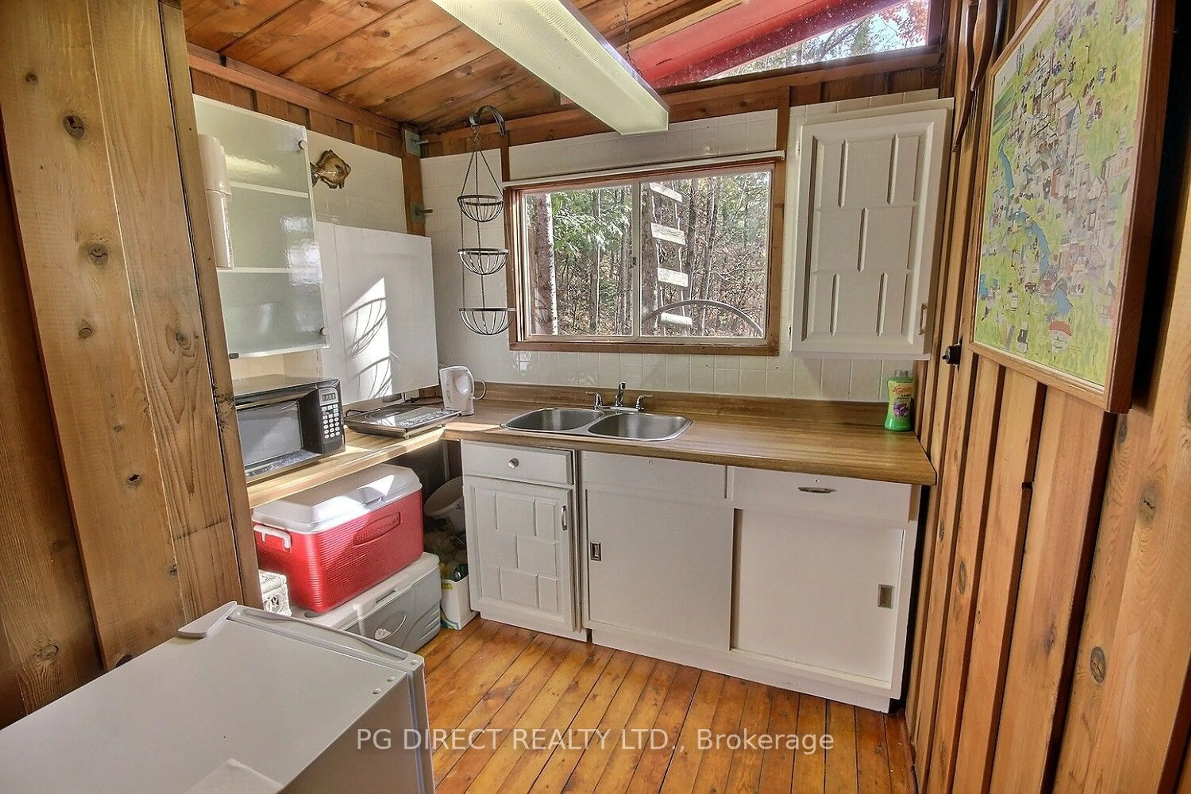 Standard kitchen, wood floors, cottage for 479 The Ridge Rd #B, Wollaston Ontario K0L 1P0