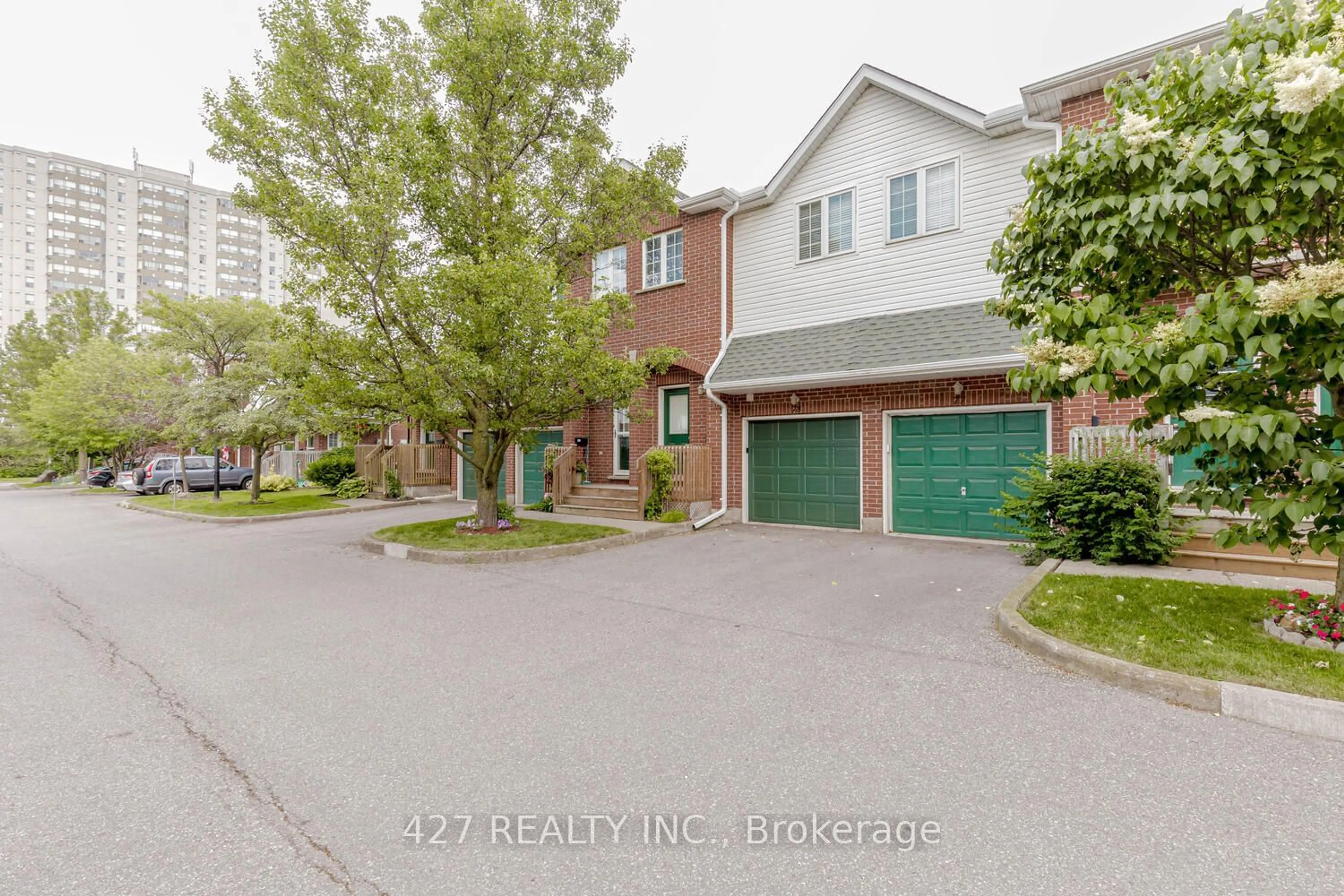 A pic from exterior of the house or condo, the street view for 42 Green Valley Dr #77, Kitchener Ontario N2P 2J8