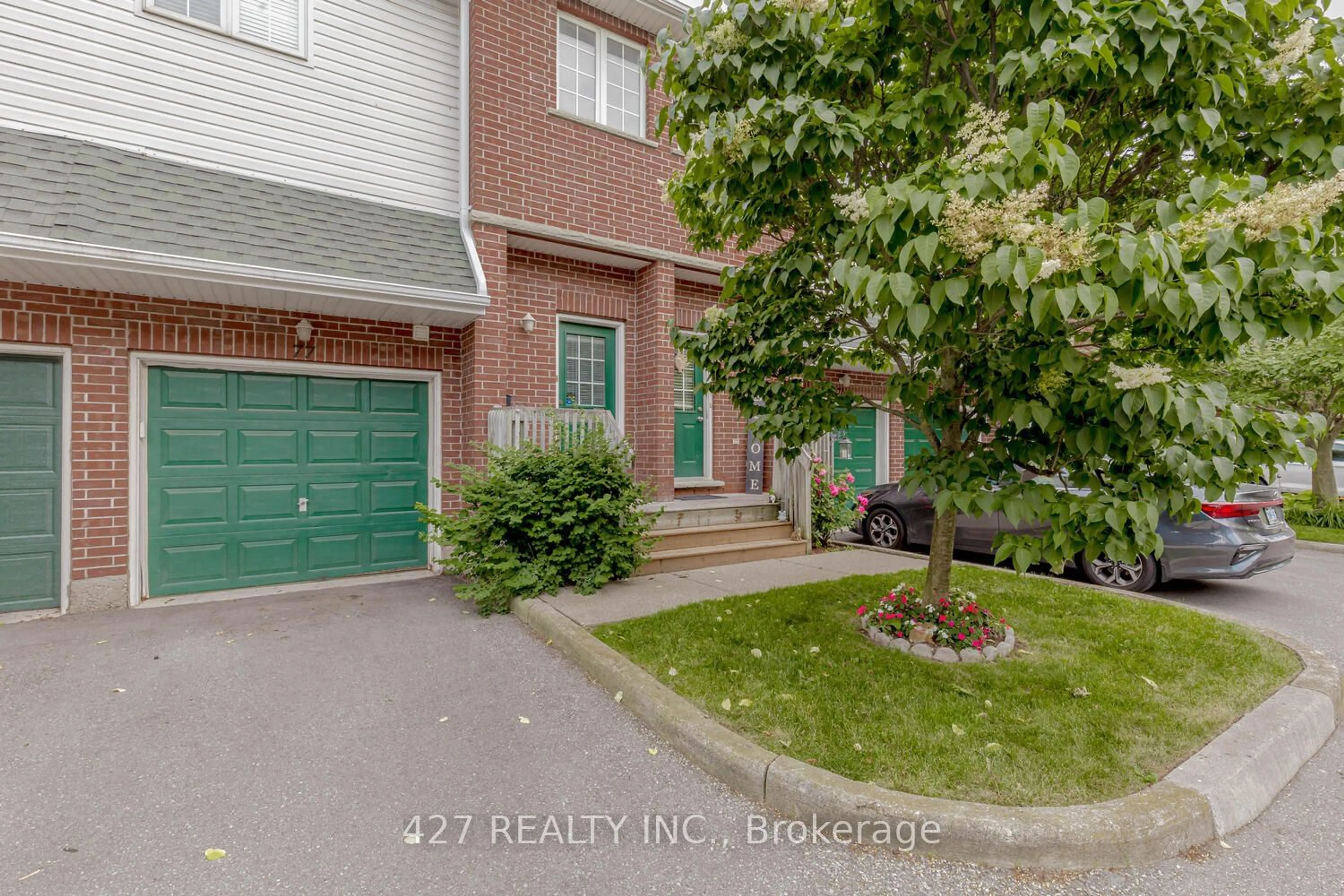 A pic from exterior of the house or condo, the street view for 42 Green Valley Dr #77, Kitchener Ontario N2P 2J8