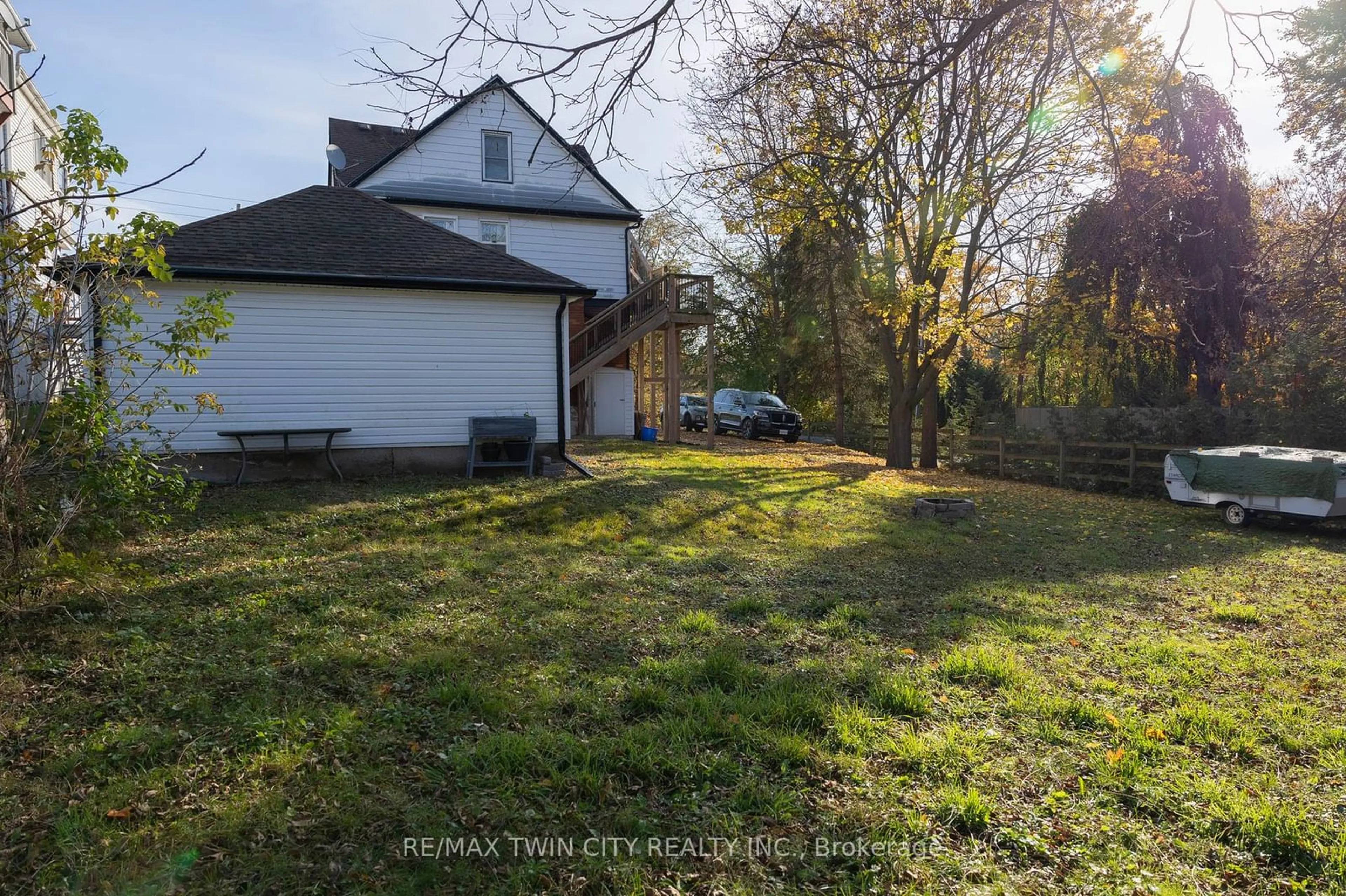 Frontside or backside of a home, the fenced backyard for 14 OLD MAIN St, Norfolk Ontario N0E 1Y0