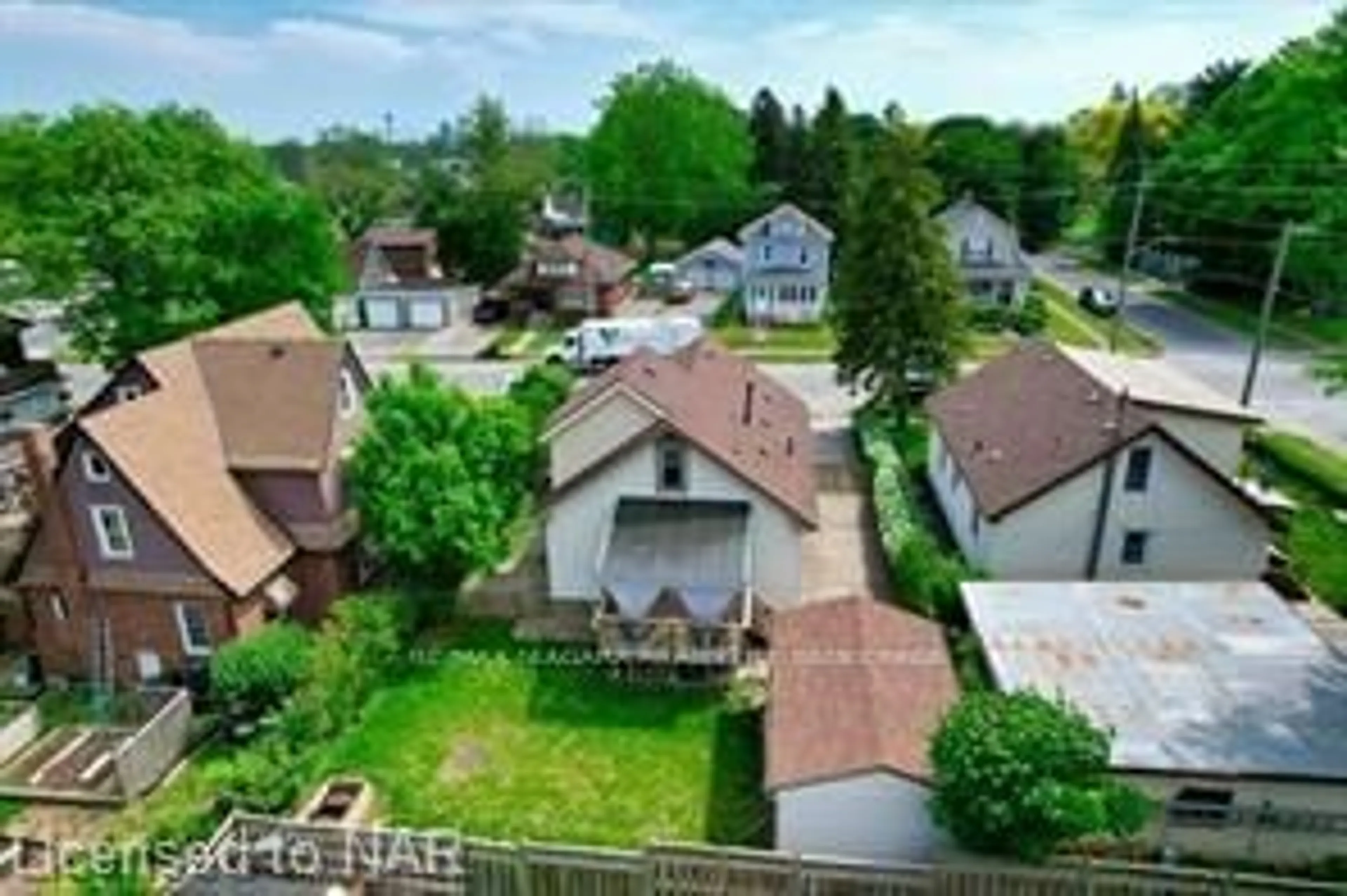 Frontside or backside of a home, the fenced backyard for 6251 CRAWFORD St, Niagara Falls Ontario L2E 5Y5