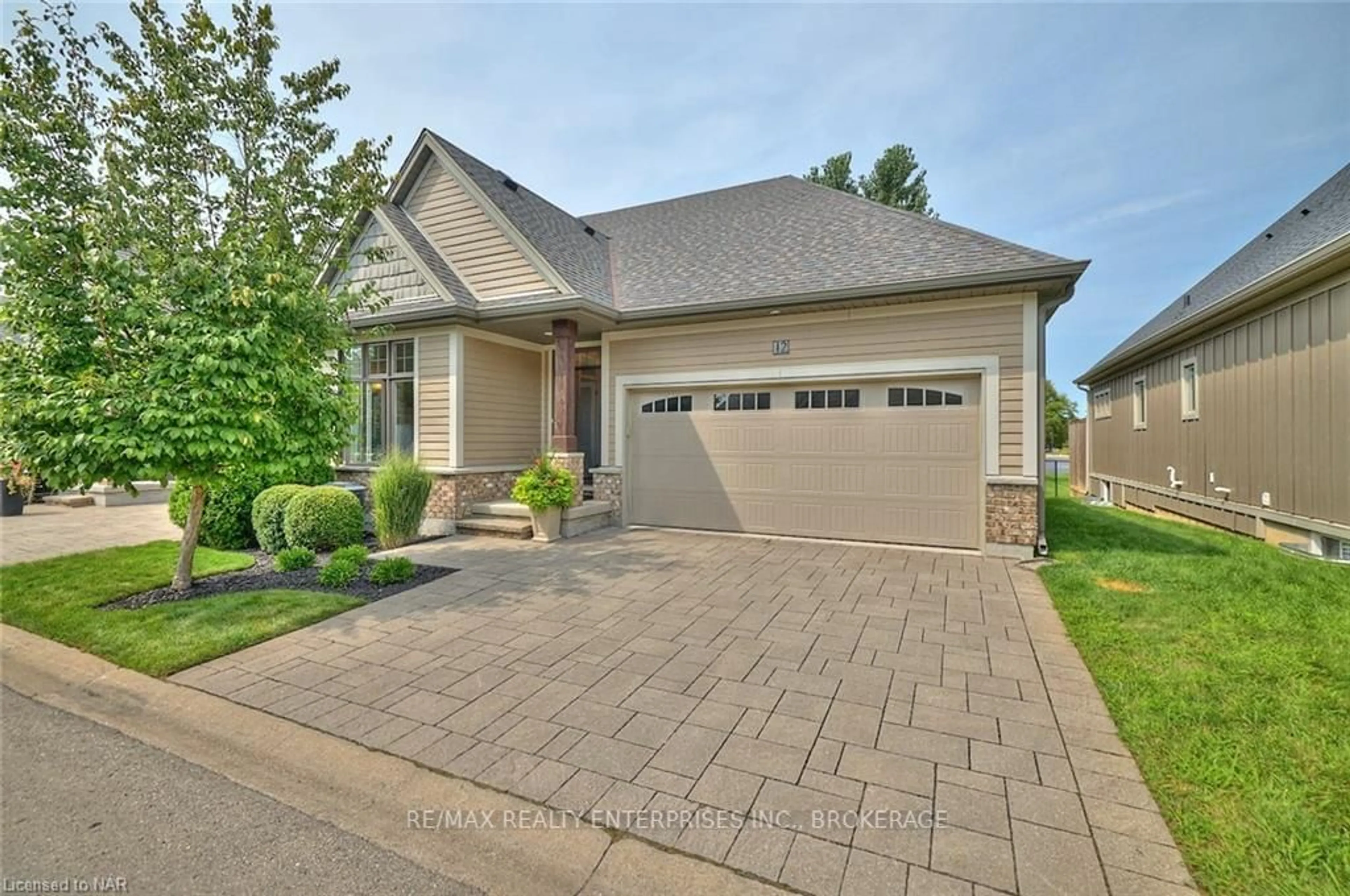 Home with brick exterior material for 12 COBBLESTONE Dr, Niagara-on-the-Lake Ontario L0S 1J1