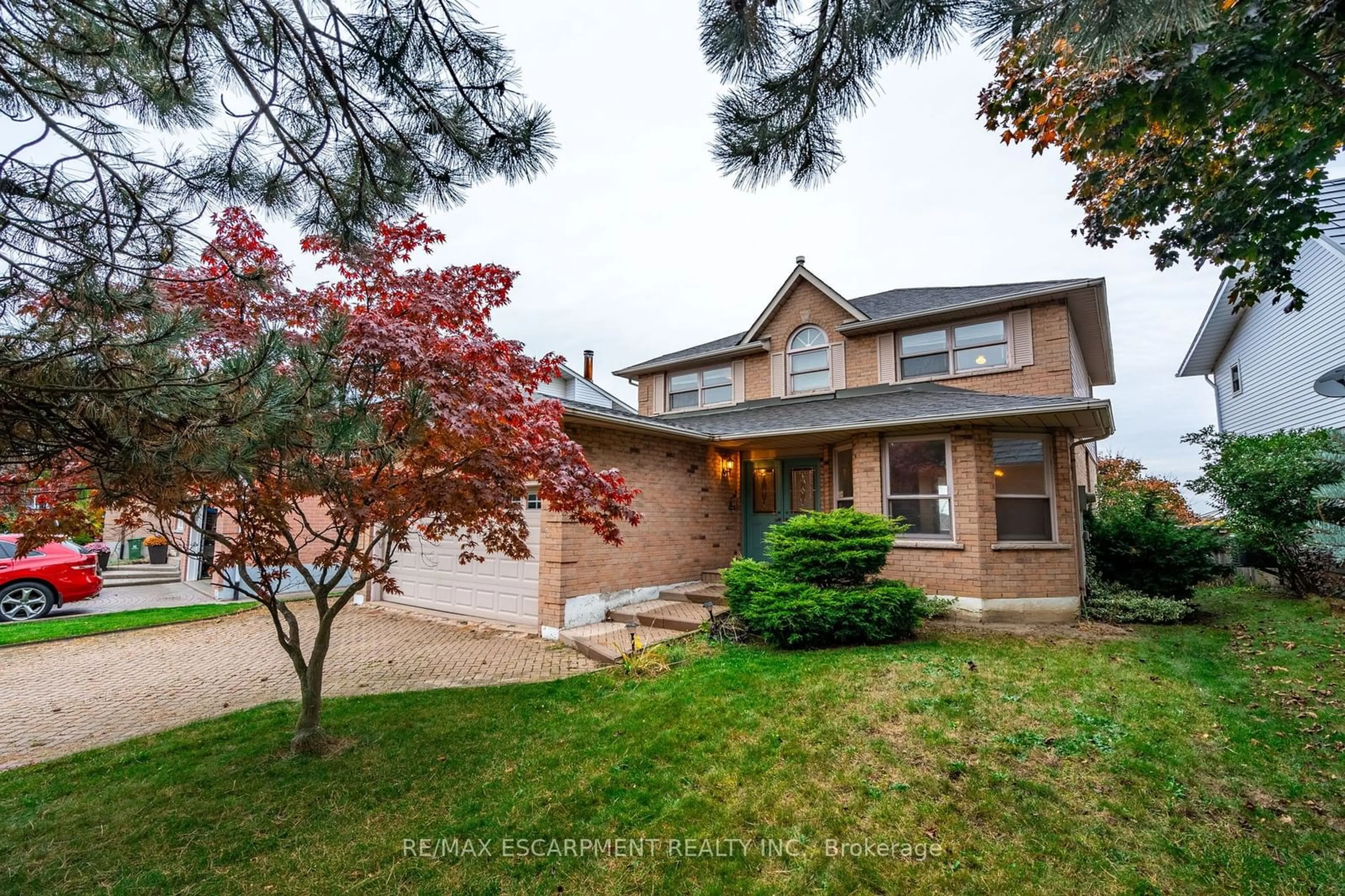 Frontside or backside of a home, the street view for 15 Ashcroft Dr, Hamilton Ontario L8W 3E9