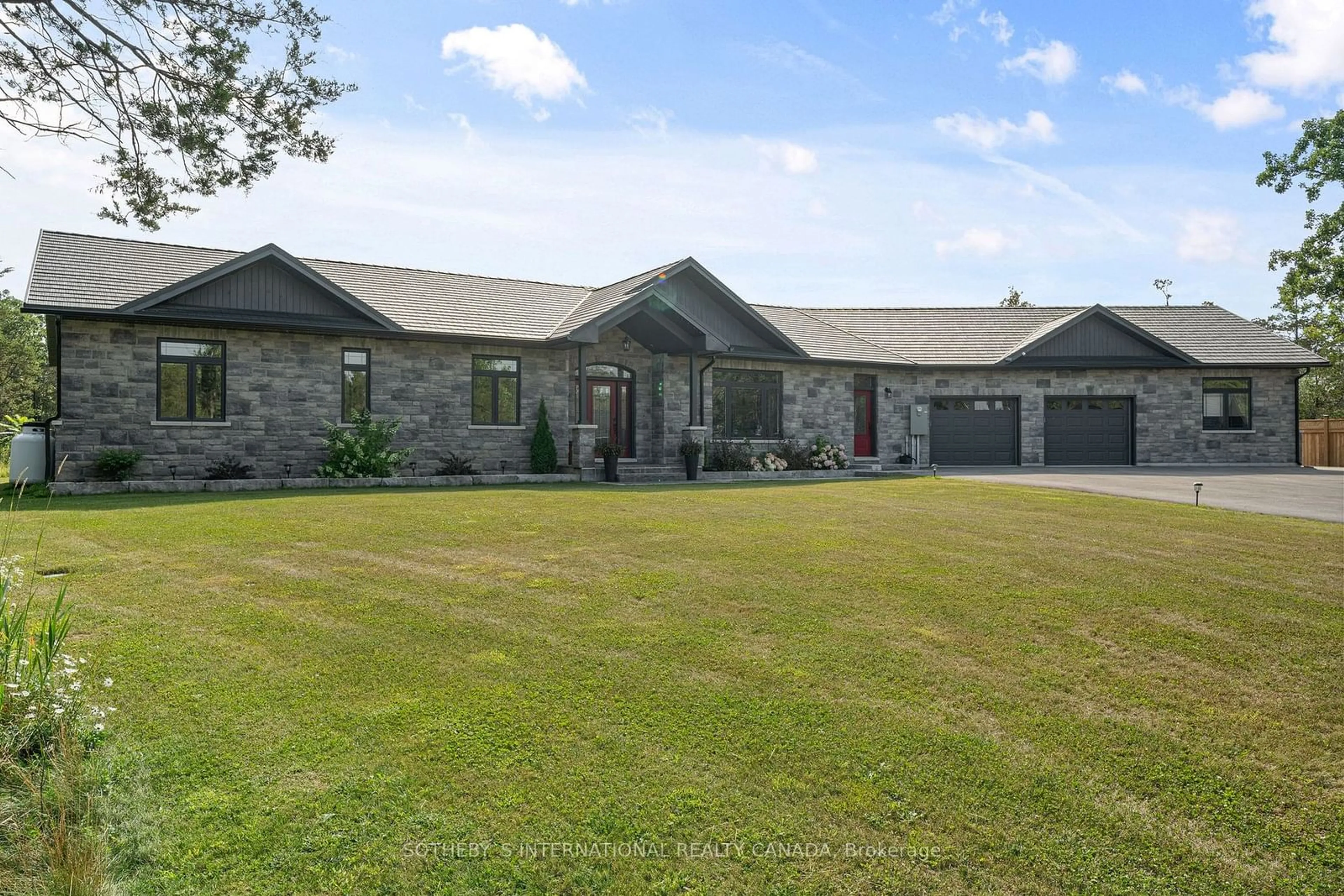 Frontside or backside of a home, cottage for 90 Sunrise Dr, Prince Edward County Ontario K8N 4Z7