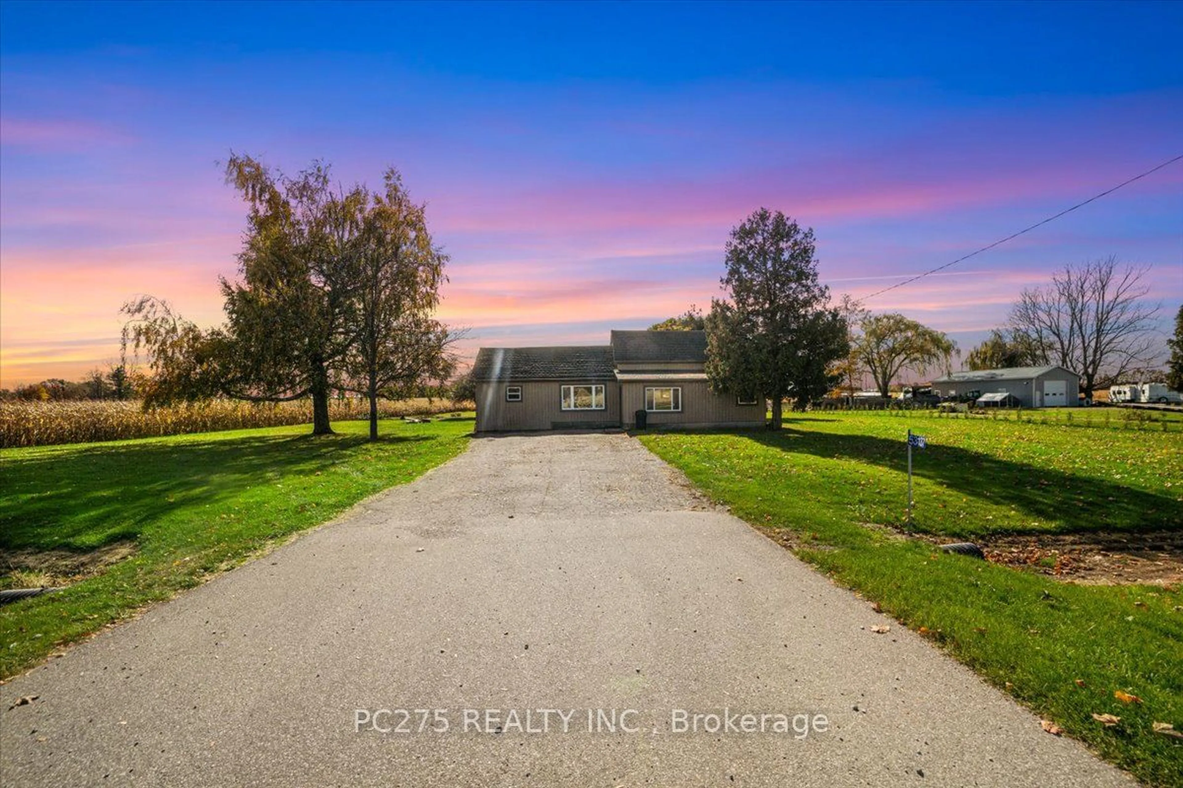 Frontside or backside of a home, the fenced backyard for 53137 Calton Line, Malahide Ontario N5H 2R5