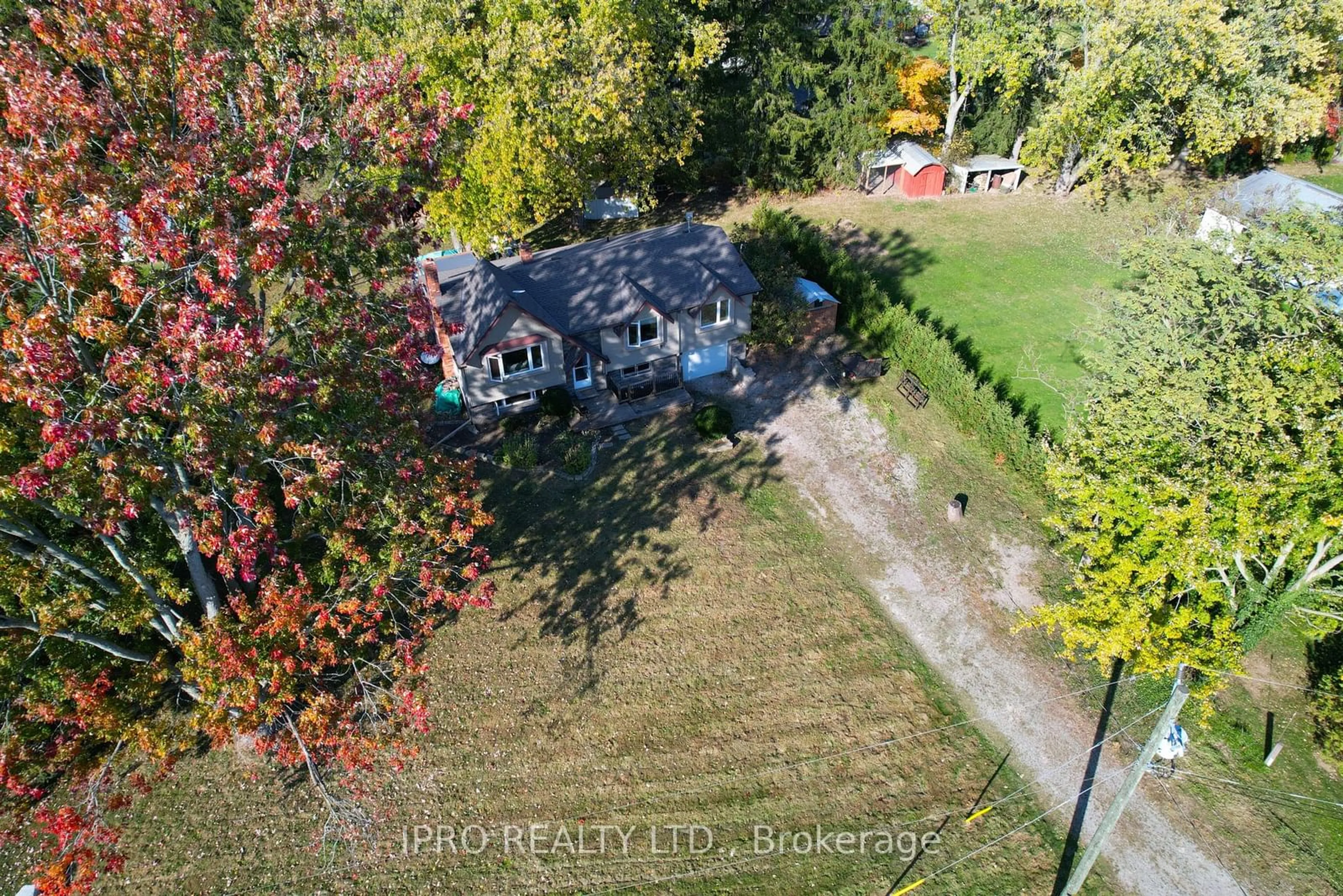 Frontside or backside of a home, the fenced backyard for 2607 Norman Rd, Hamilton Ontario N0B 1L0