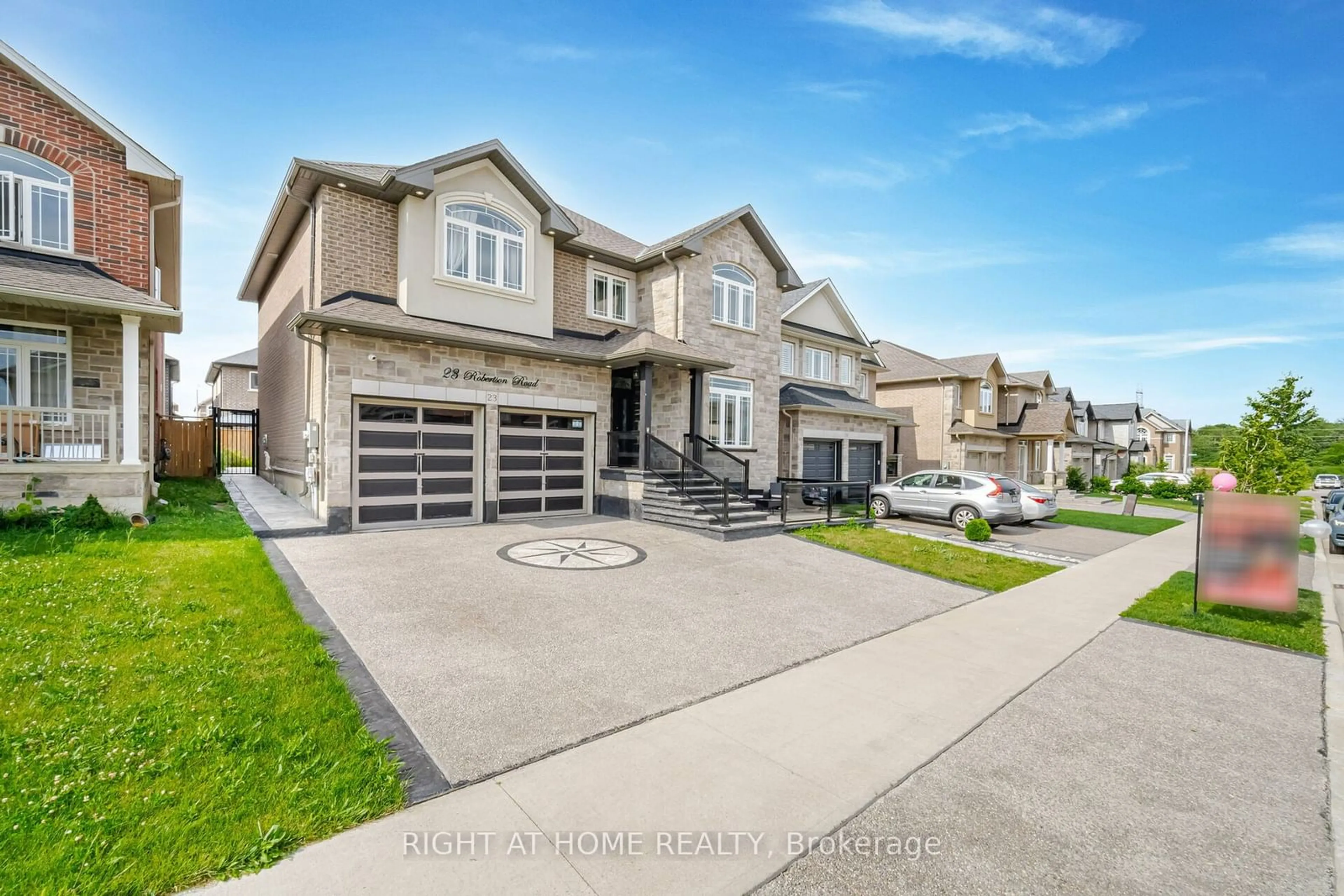 Frontside or backside of a home, the street view for 23 Robertson Rd, Hamilton Ontario L9K 0H7