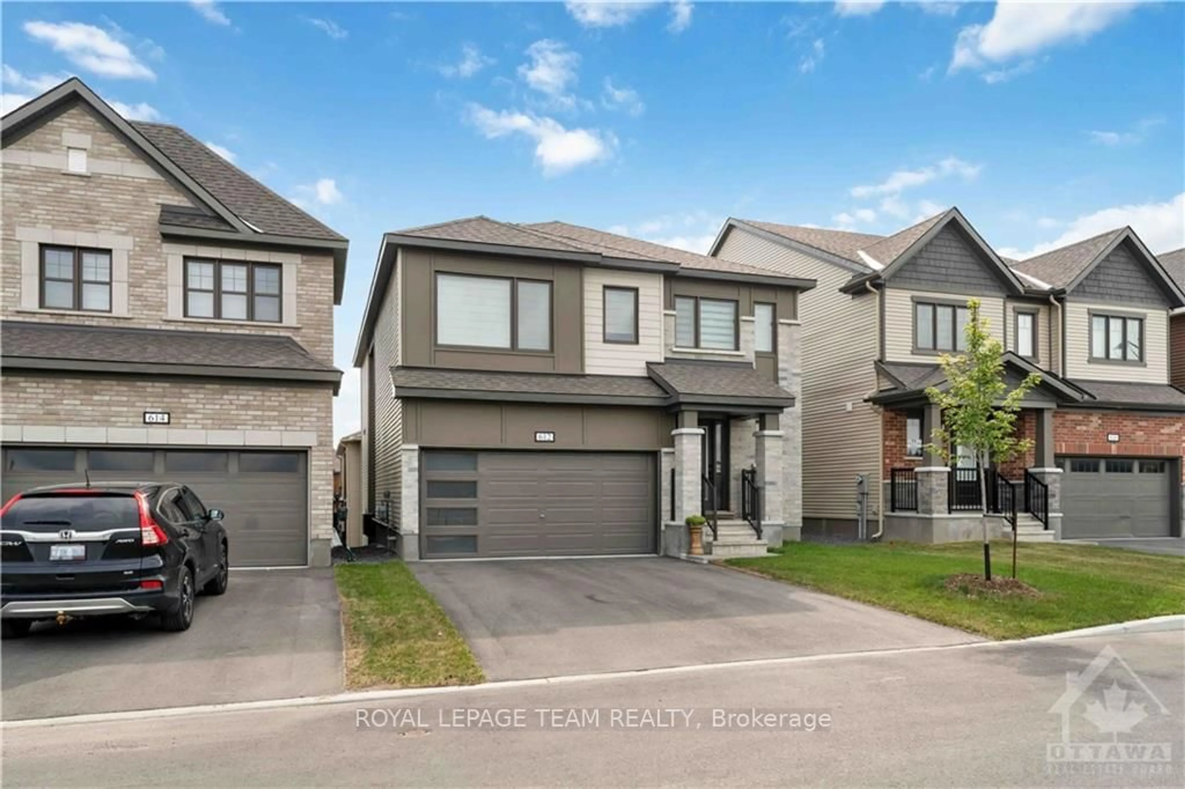 Frontside or backside of a home, the street view for 612 RYE GRASS Way, Barrhaven Ontario K2J 6Z9