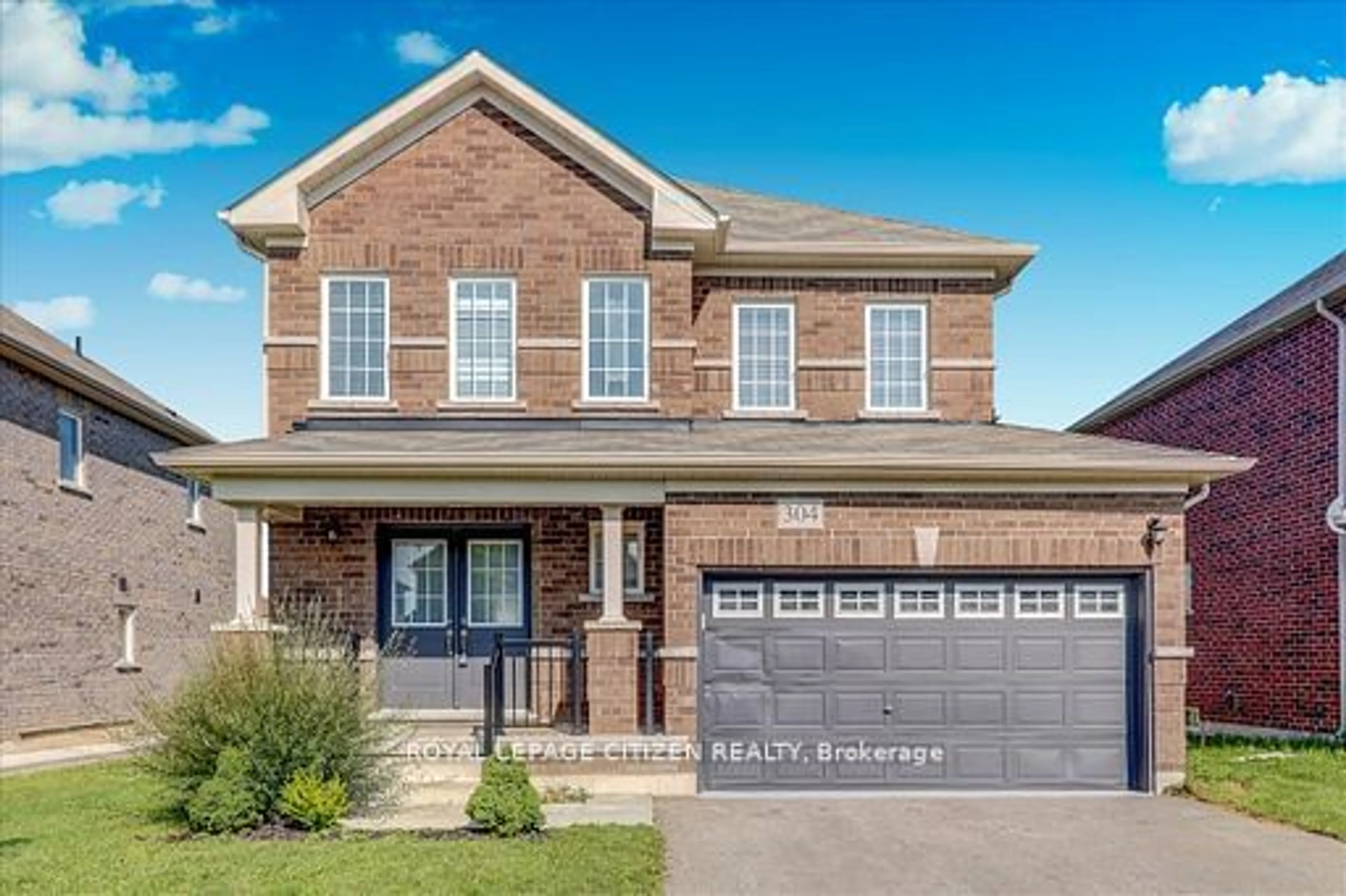 Home with brick exterior material for 304 Van Dusen Ave, Southgate Ontario N0C 1B0