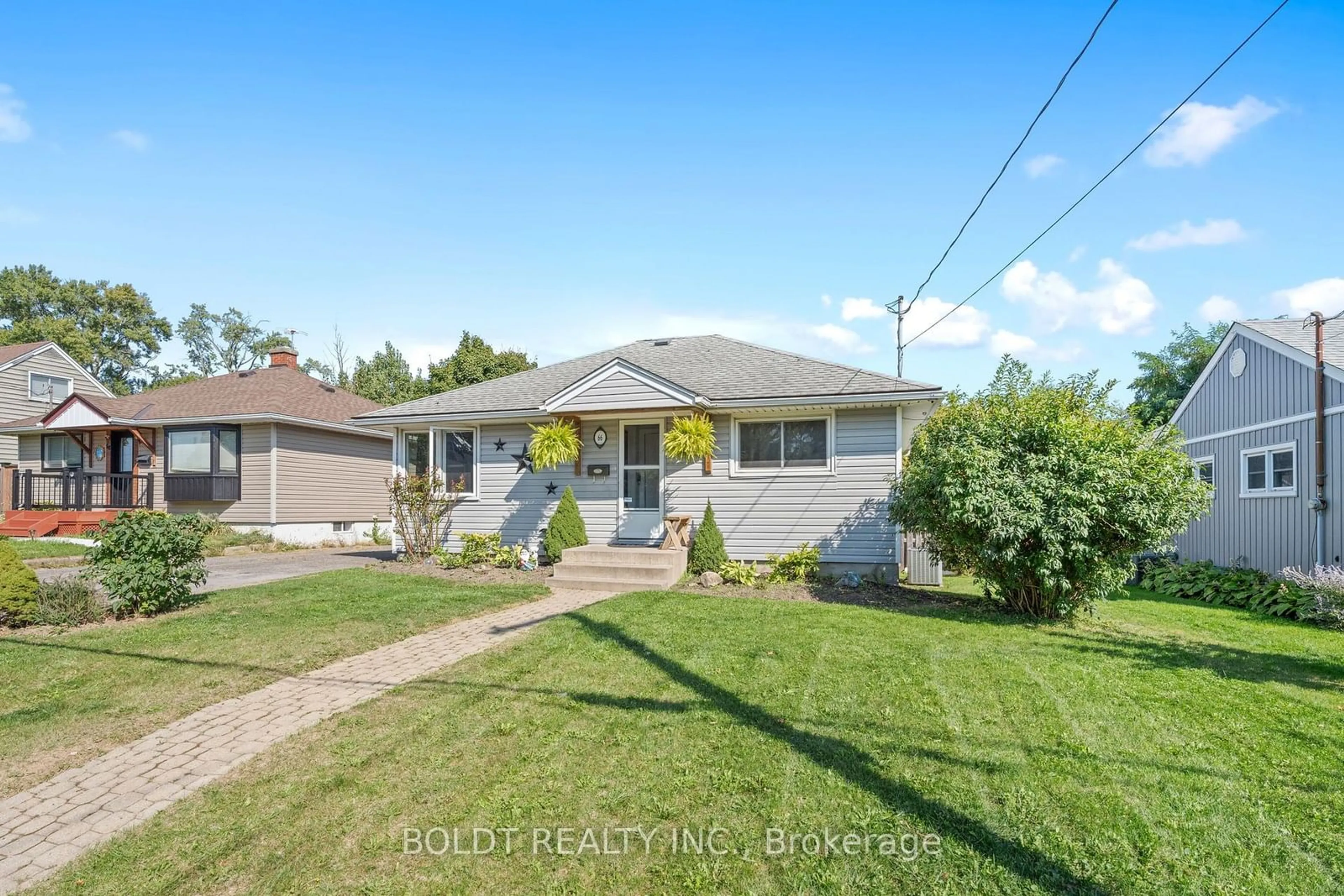 Frontside or backside of a home, the fenced backyard for 66 Whyte Ave, Thorold Ontario L2V 2T7