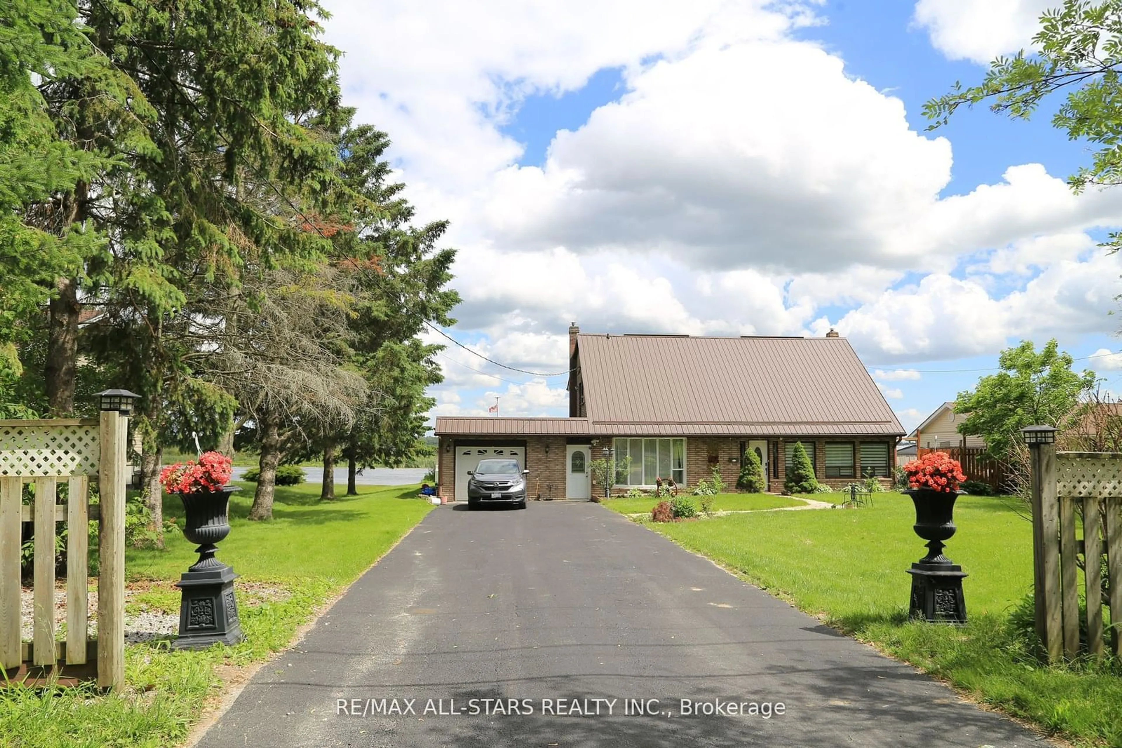 Frontside or backside of a home, the street view for 122 Fenelon Dr, Kawartha Lakes Ontario K0M 1G0