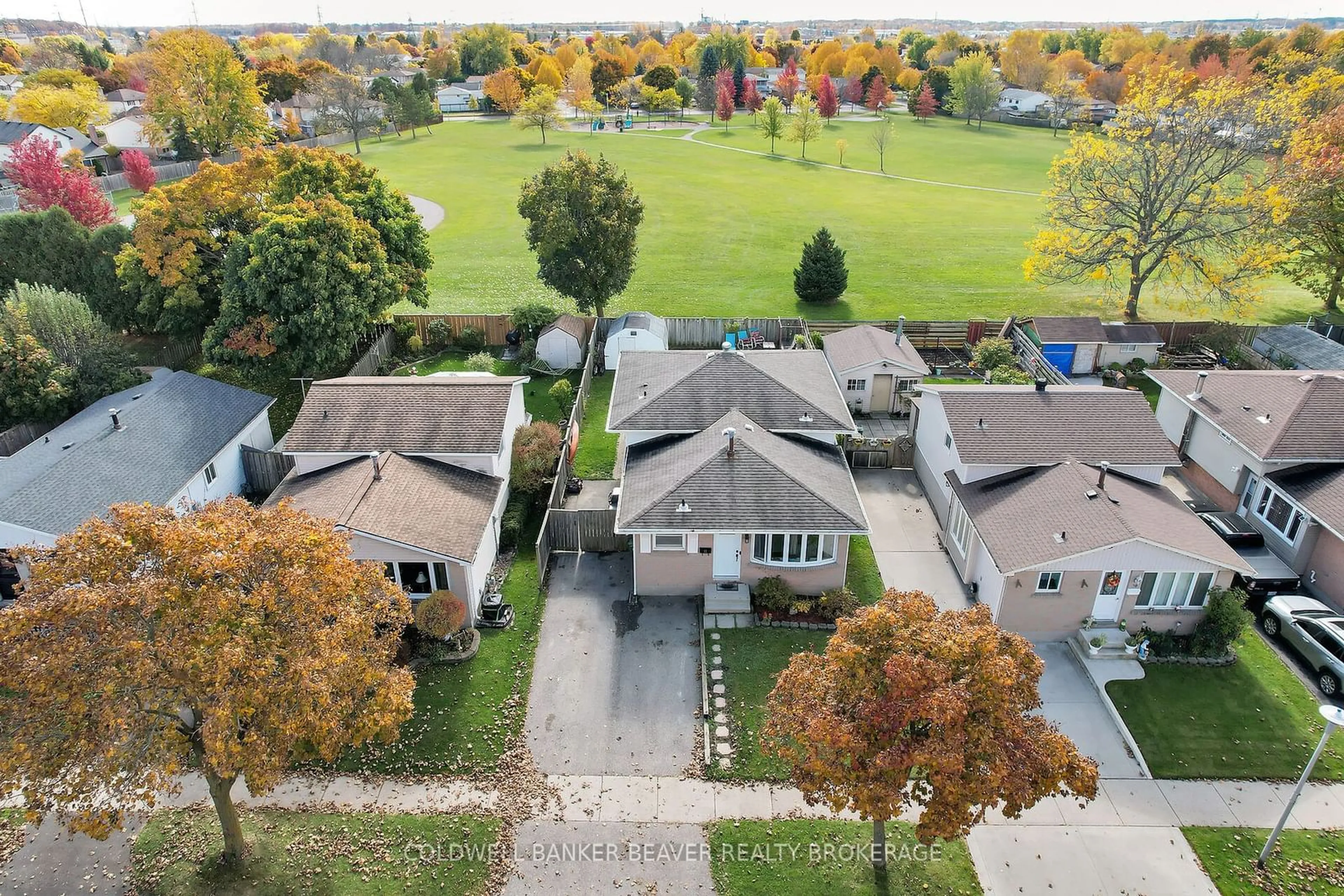 Frontside or backside of a home, the fenced backyard for 22 Bridlington Rd, London Ontario N6E 1X4