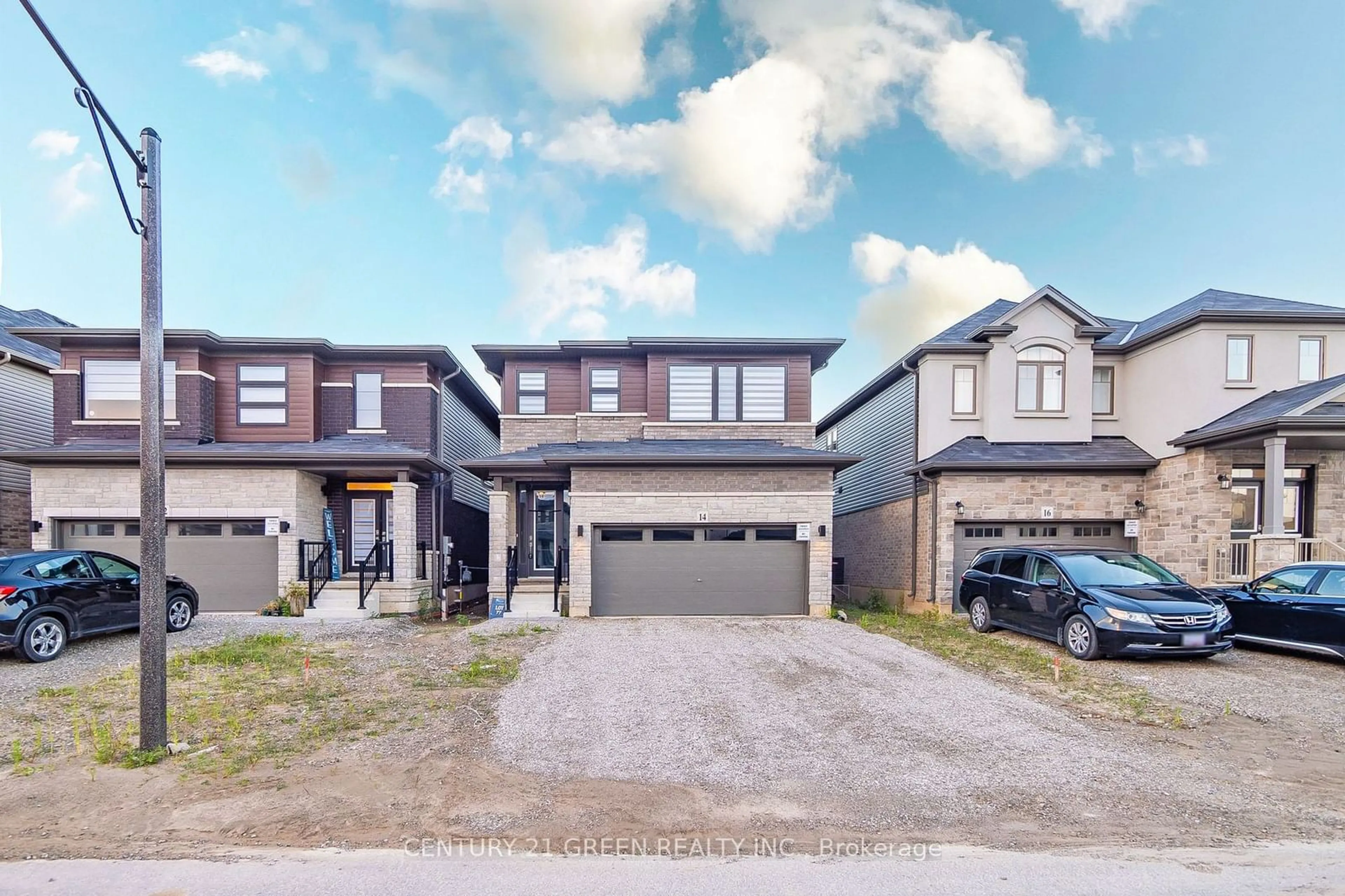 Frontside or backside of a home, the street view for 14 Holder Dr, Brantford Ontario N3T 5L5