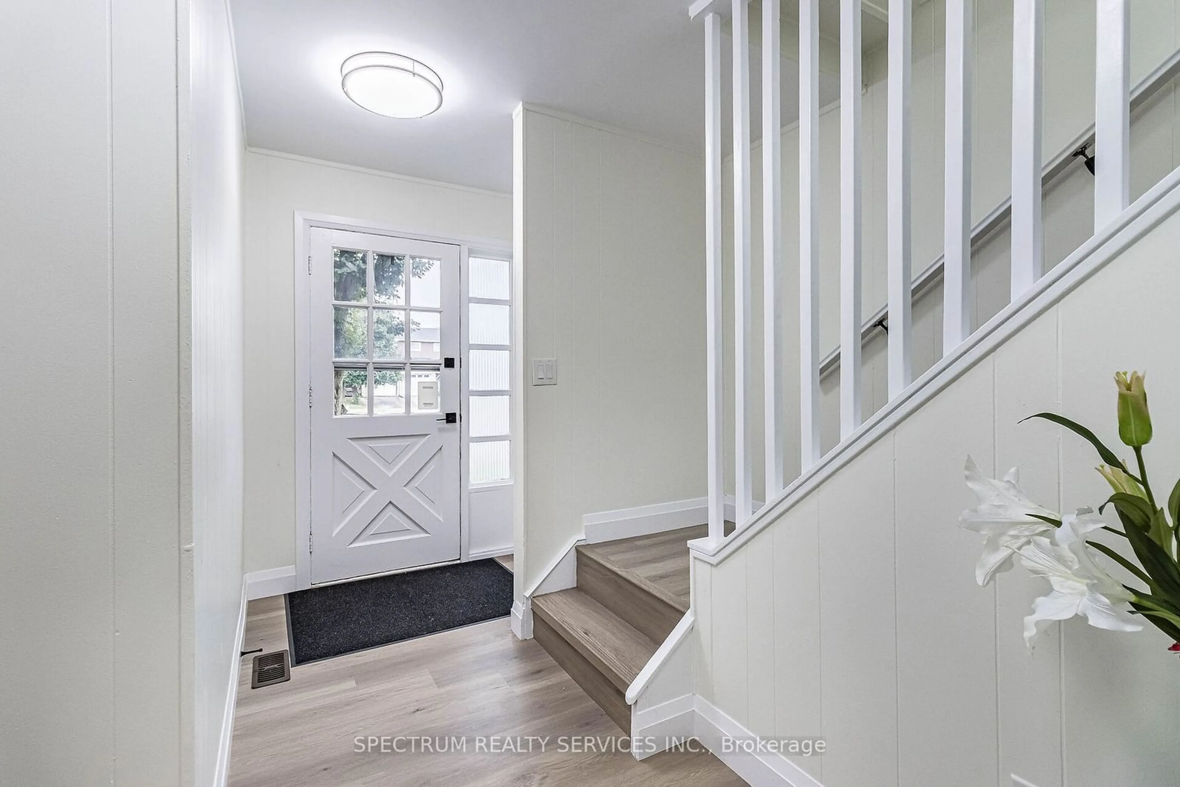 Indoor entryway, wood floors for 85 Golden Orchard Dr, Hamilton Ontario L9C 6J2