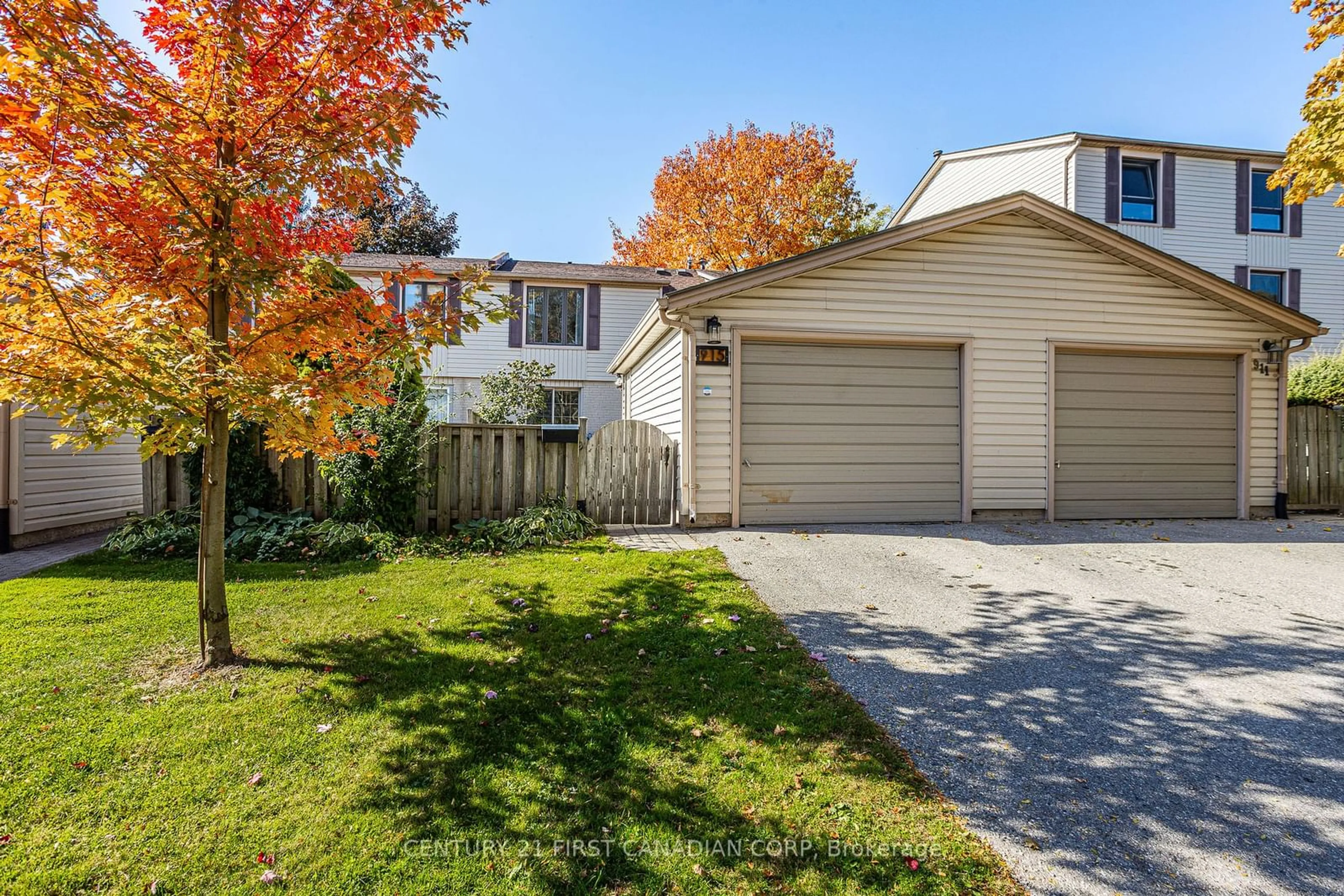 A pic from exterior of the house or condo, the fenced backyard for 915 Dalhousie Dr, London Ontario N6K 1M8