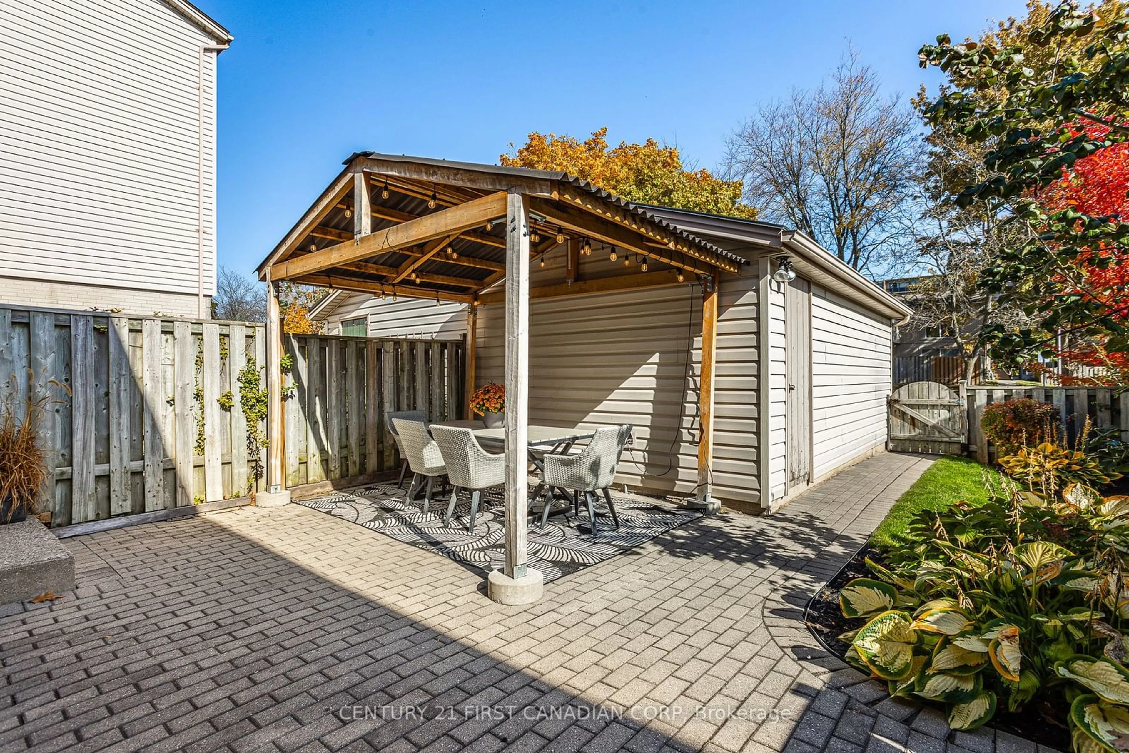 Patio, the fenced backyard for 915 Dalhousie Dr, London Ontario N6K 1M8