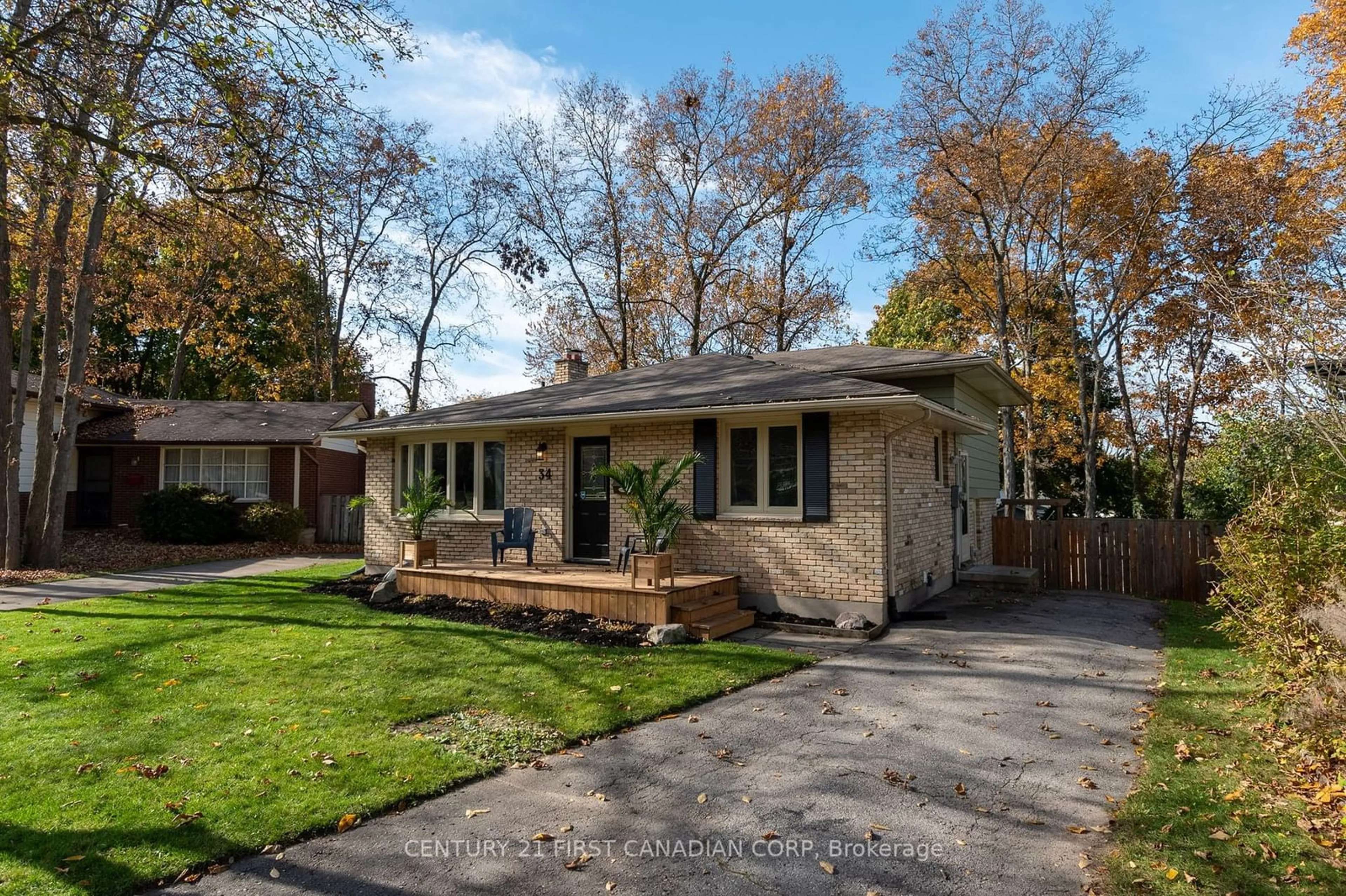 Frontside or backside of a home, the fenced backyard for 34 Blue Ridge Cres, London Ontario N6K 2X1