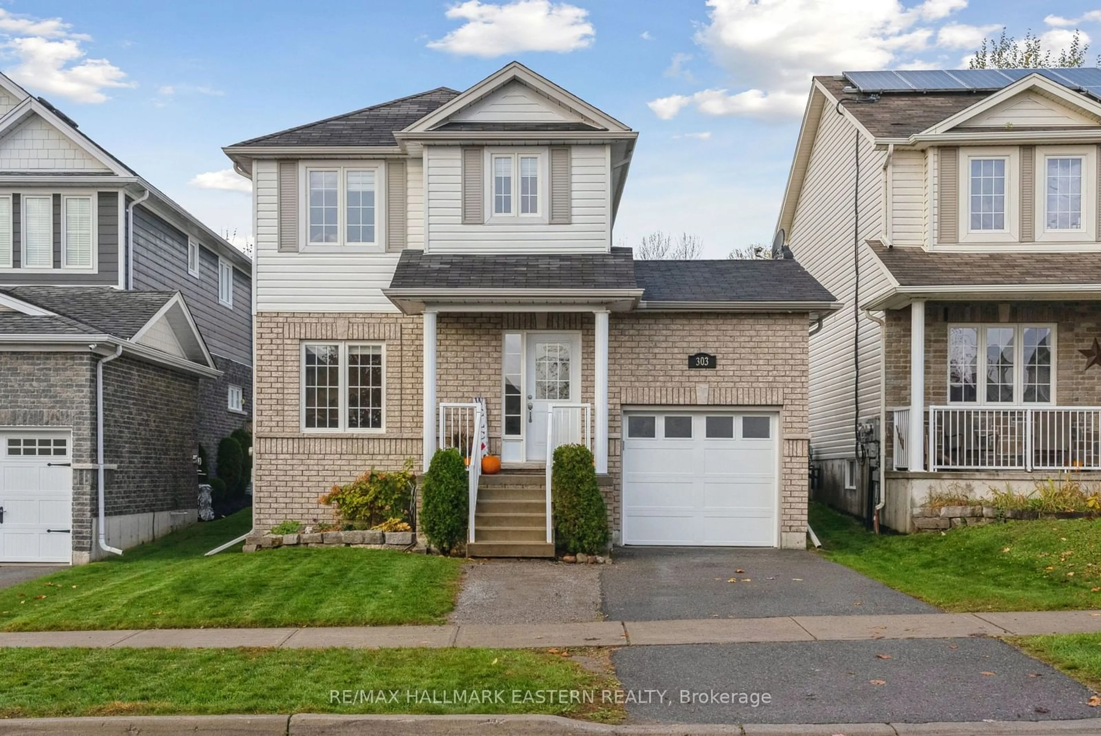 Frontside or backside of a home, the street view for 303 Blacksmith Way, Peterborough Ontario K9L 0B5